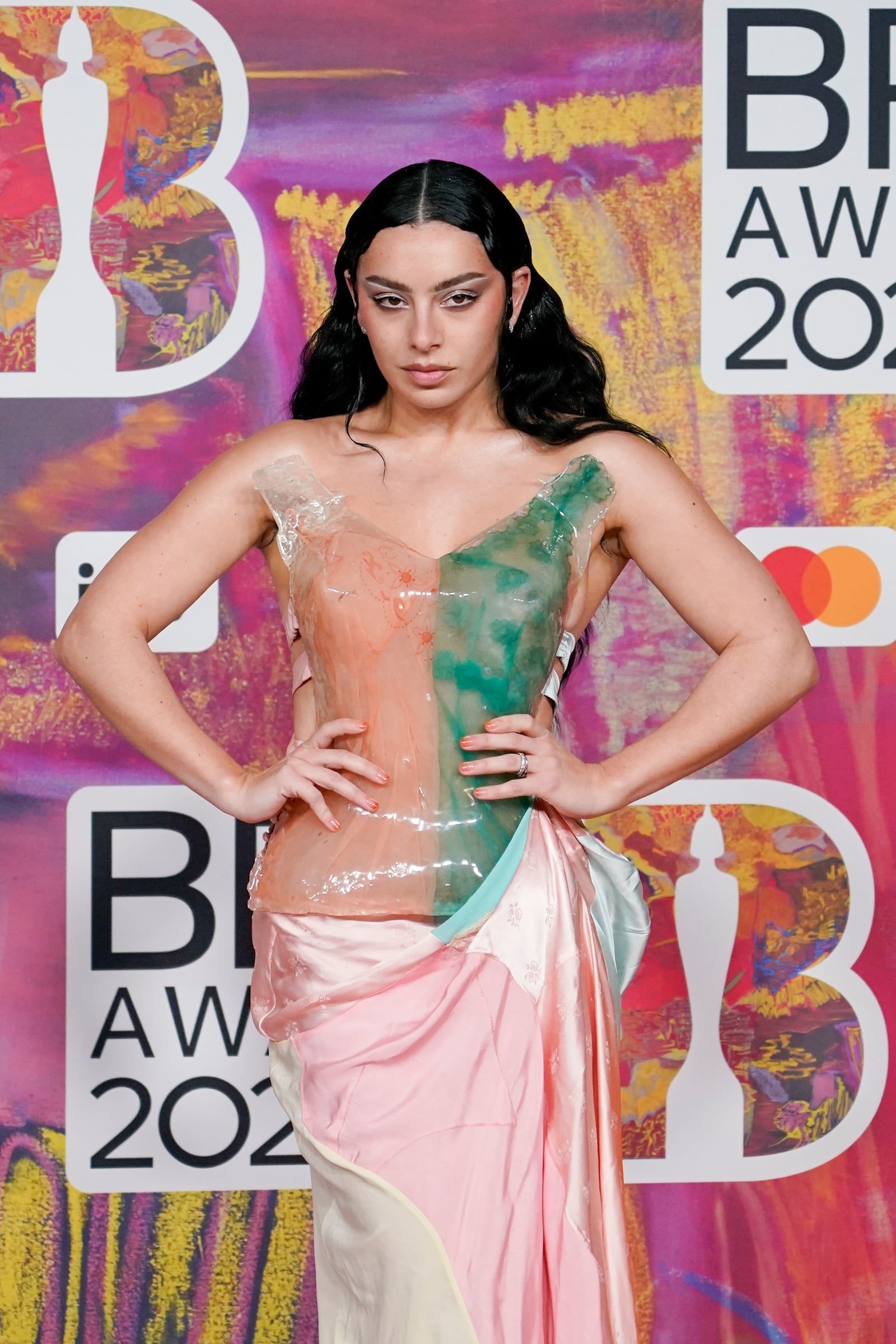 FILE - Charli XCX poses for photographers upon arrival at the Brit Awards 2024 in London, Saturday, March. 2, 2024. (Photo by Alberto Pezzali/Invision/AP, File)