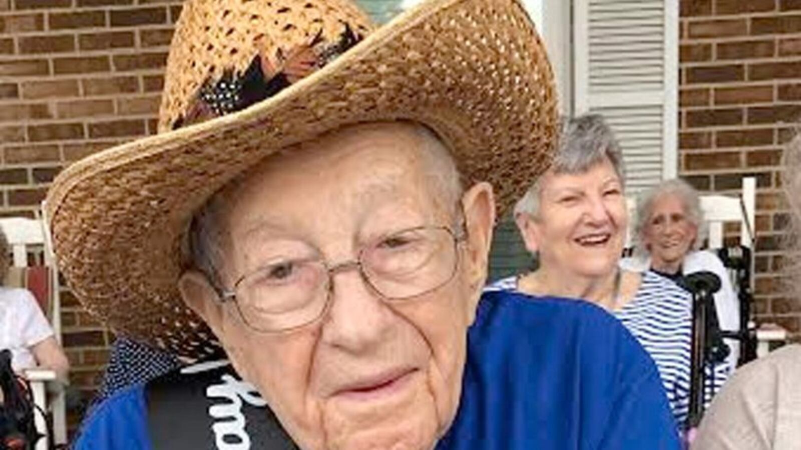 On Saturday, July 23, a parade of cars drove by Kenny Snavely’s apartment, honking horns, waving arms and wishing him a happy 105th birthday.