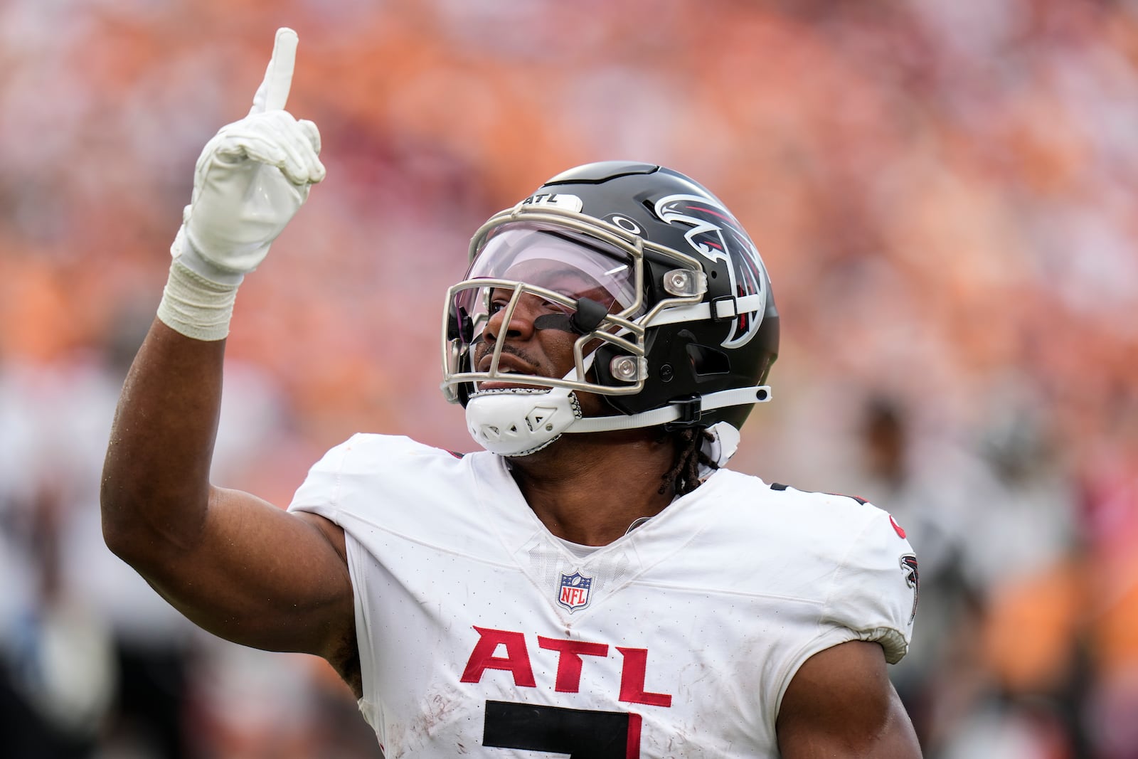 Atlanta Falcons running back Bijan Robinson (7) celebrates his touchdown against the Tampa Bay Buccaneers during the second half of an NFL football game, Sunday, Oct. 27, 2024, in Tampa. (AP Photo/Chris O'Meara)