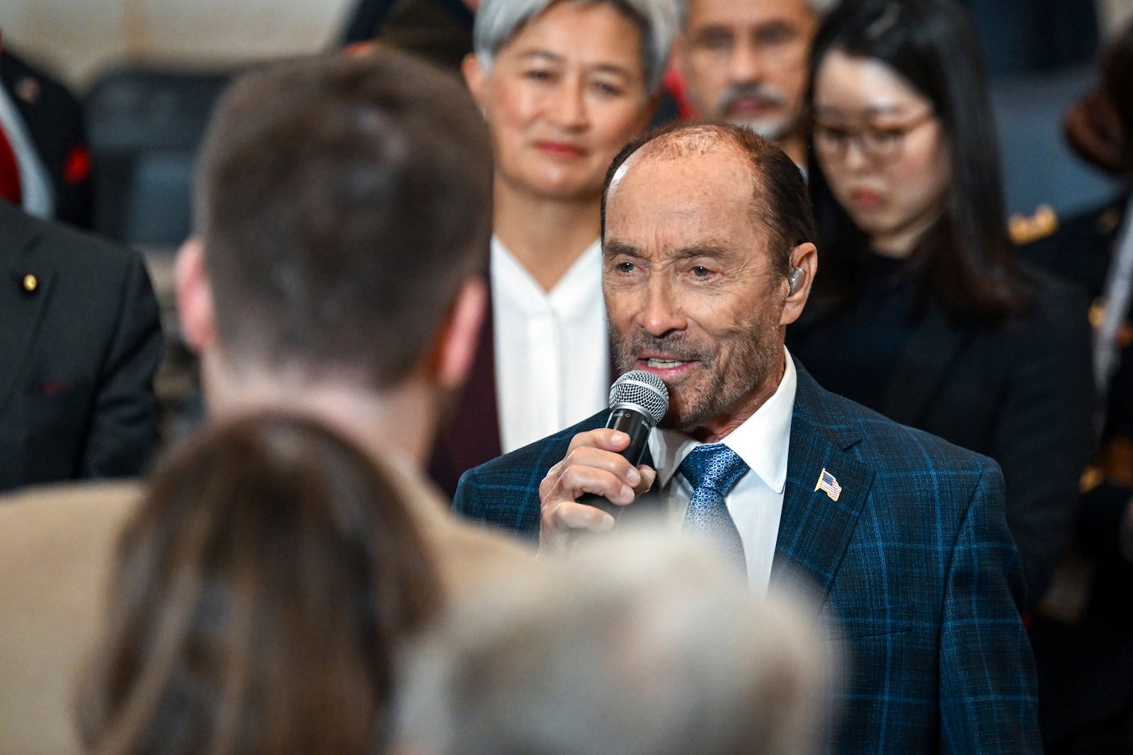 Lee Greenwood sings before the 60th Presidential Inauguration in the Rotunda of the U.S. Capitol in Washington, Monday, Jan. 20, 2025. (Kenny Holston/The New York Times via AP, Pool)