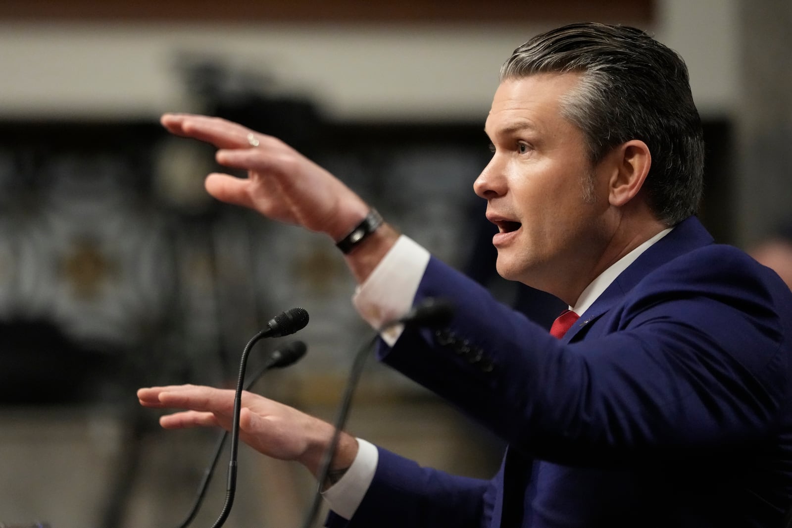 Pete Hegseth, President-elect Donald Trump's choice to be Defense secretary, speaks before the Senate Armed Services Committee for his confirmation hearing, at the Capitol in Washington, Tuesday, Jan. 14, 2025. (AP Photo/Ben Curtis)