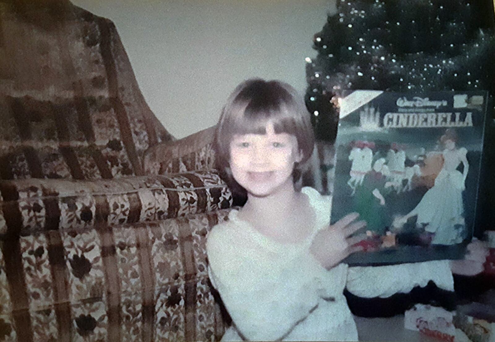 Kriedman grew up in Kettering with a love of reading and writing. She is shown in 1982 after receiving an audio recording of a favorite book, "Cinderella" for Christmas.