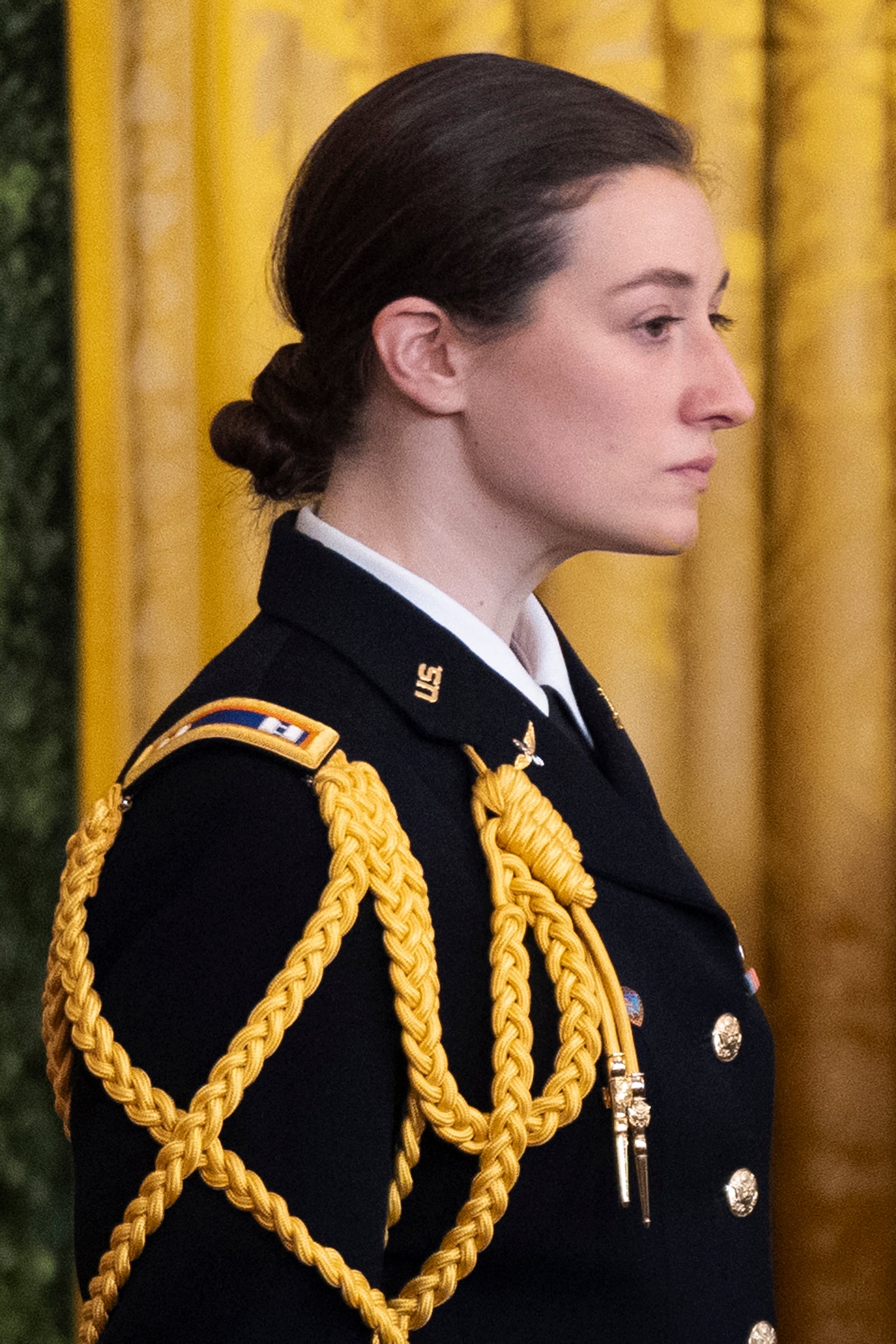 FILE - Army Capt. Rebecca M. Lobach, of Durham, N.C., is seen during the Presidential Medal of Freedom ceremony in the East Room of the White House, Jan. 4, 2025, in Washington. (AP Photo/Manuel Balce Ceneta, File)