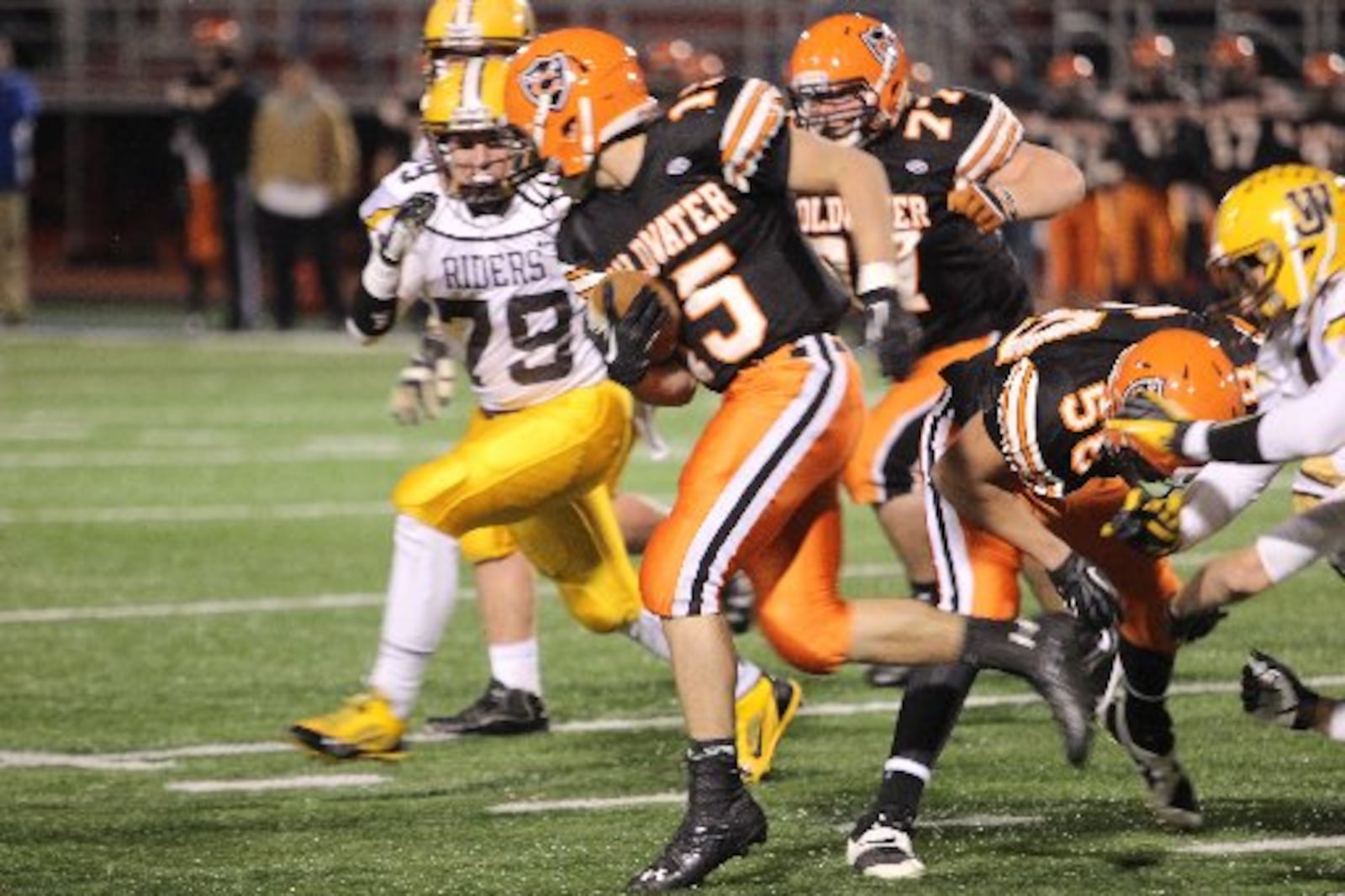 Coldwater quarterback Brody Hoying ran for 134 first-half yards and scored on an 84-yard romp in leading the Cavs to a 14-7 halftime lead over West Jefferson in a D-V state football semifinal at Piqua on Saturday, Nov. 30, 2013.