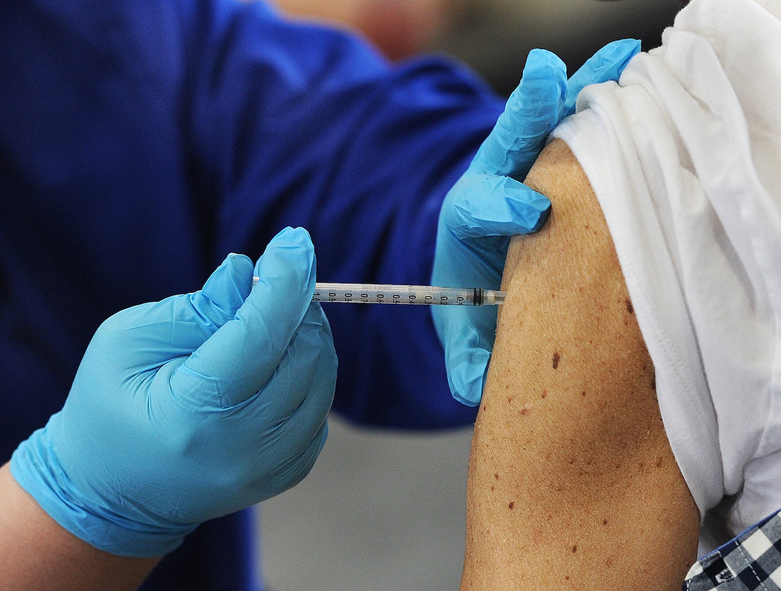 The Kettering Health Network held at vaccine clinic at the Grace United Methodist Church, Thursday, Jan. 28, 2021. MARSHALL GORBY\STAFF