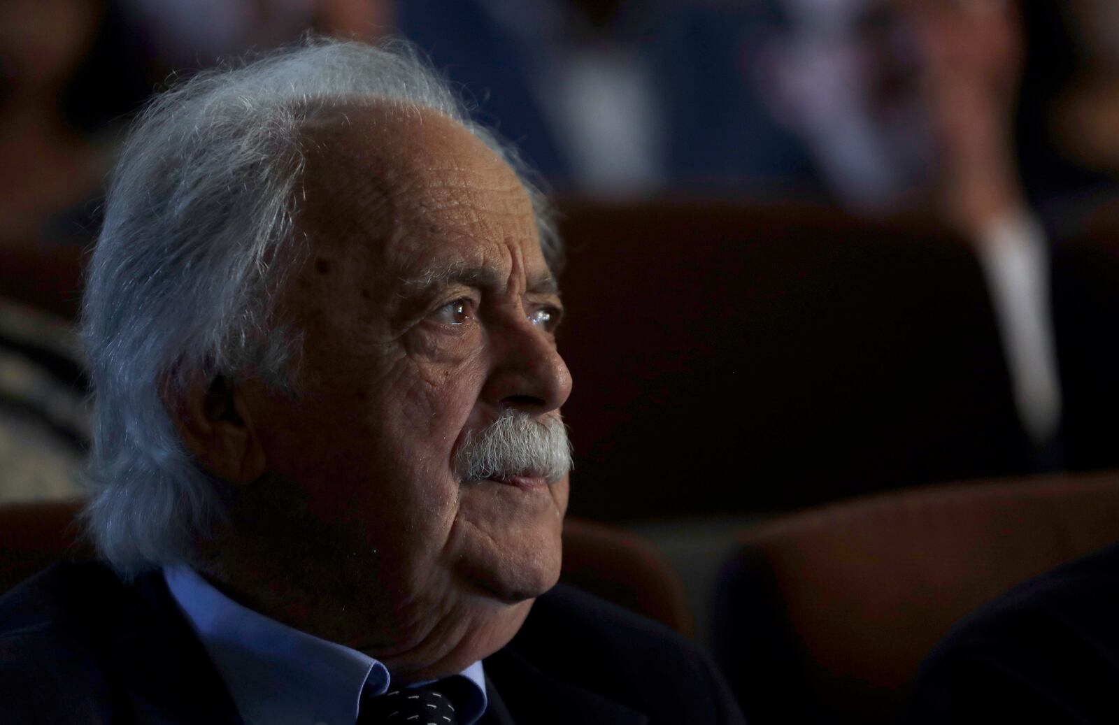 FILE —In this Tuesday, March 28, 2017 file photo, George Bizos, anti-apartheid activist, life-long friend and lawyer of the late former President Nelson Mandela, listens to speeches during the memorial service for Ahmed Kathrada, at the Nelson Mandela Foundation in Johannesburg, South Africa, Tuesday, March 28, 2017.  Bizos died Wednesday Sept. Sept. 9, 2020, aged 92. (AP Photo/Themba Hadebe, FILE)