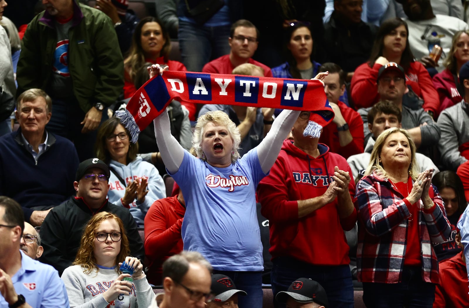 Dayton fans cheer during a game against Cincinnati on Saturday, Dec. 16, 2023, at the Heritage Bank Center in Cincinnati. David Jablonski/Staff