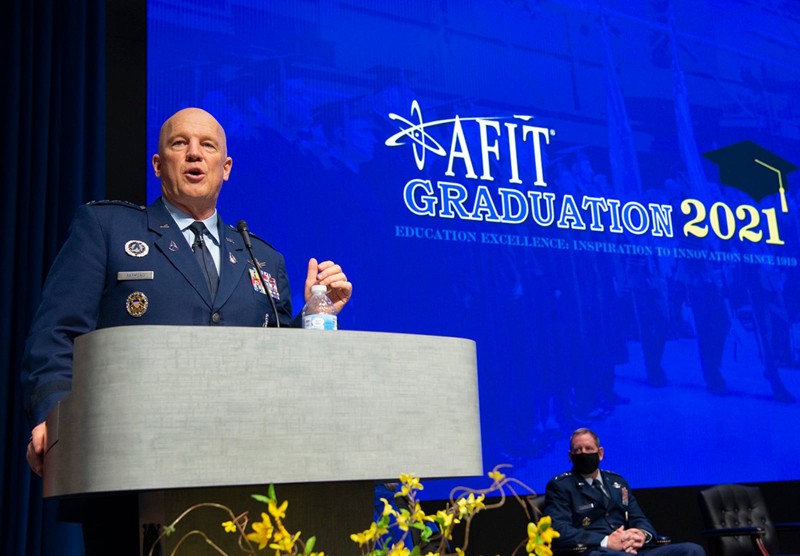 Gen. John W. “Jay” Raymond, chief of Space Operations, delivers remarks March 25 at the Air Force Institute of Technology graduation ceremony on Wright-Patterson Air Force Base. U.S. AIR FORCE PHOTO/R.J. ORIEZ