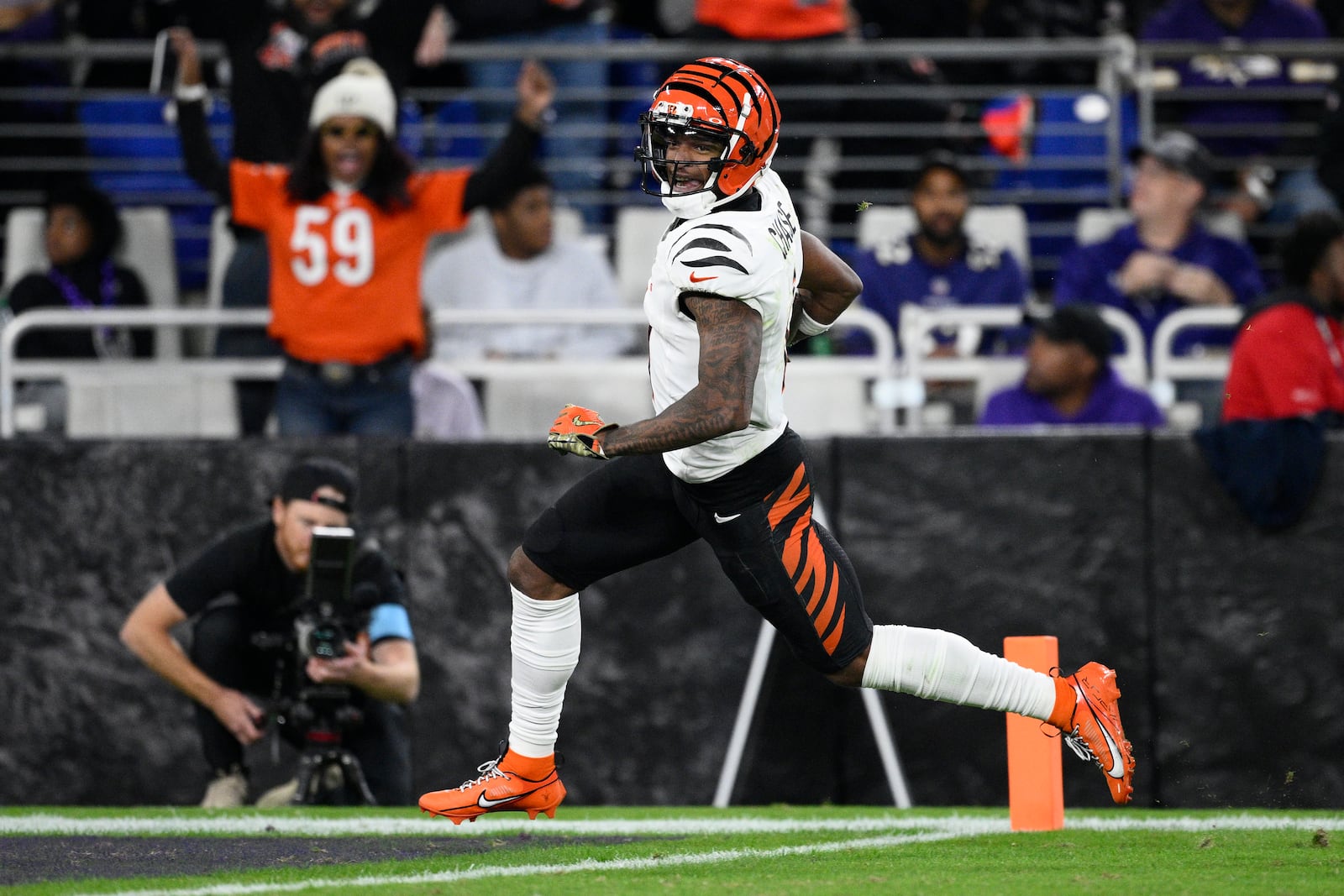 Cincinnati Bengals wide receiver Ja'Marr Chase runs for a 67-yard touchdown during the second half of an NFL football game against the Baltimore Ravens, Thursday, Nov. 7, 2024, in Baltimore. (AP Photo/Nick Wass)