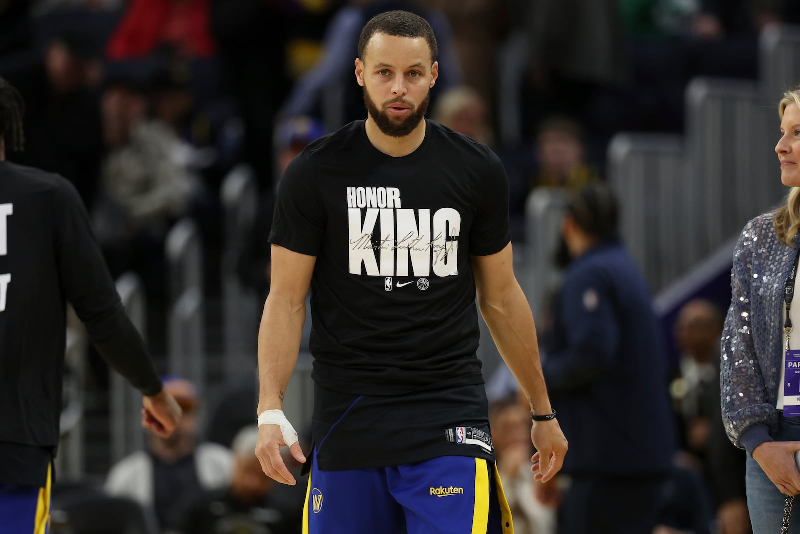 Golden State Warriors guard Stephen Curry warms up prior to an NBA basketball game against the Boston Celtics in San Francisco, Monday, Jan. 20, 2025. (AP Photo/Jed Jacobsohn)