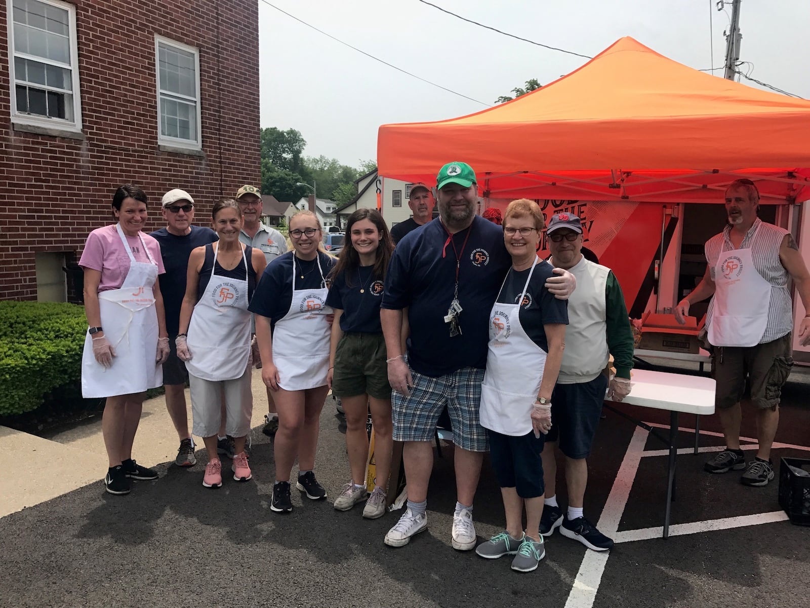 John “Sully” Sullivan at Food for the Journey Project lunch giveaway Friday at East Dayton Fellowship Church. (Photo by Tom Archdeacon)