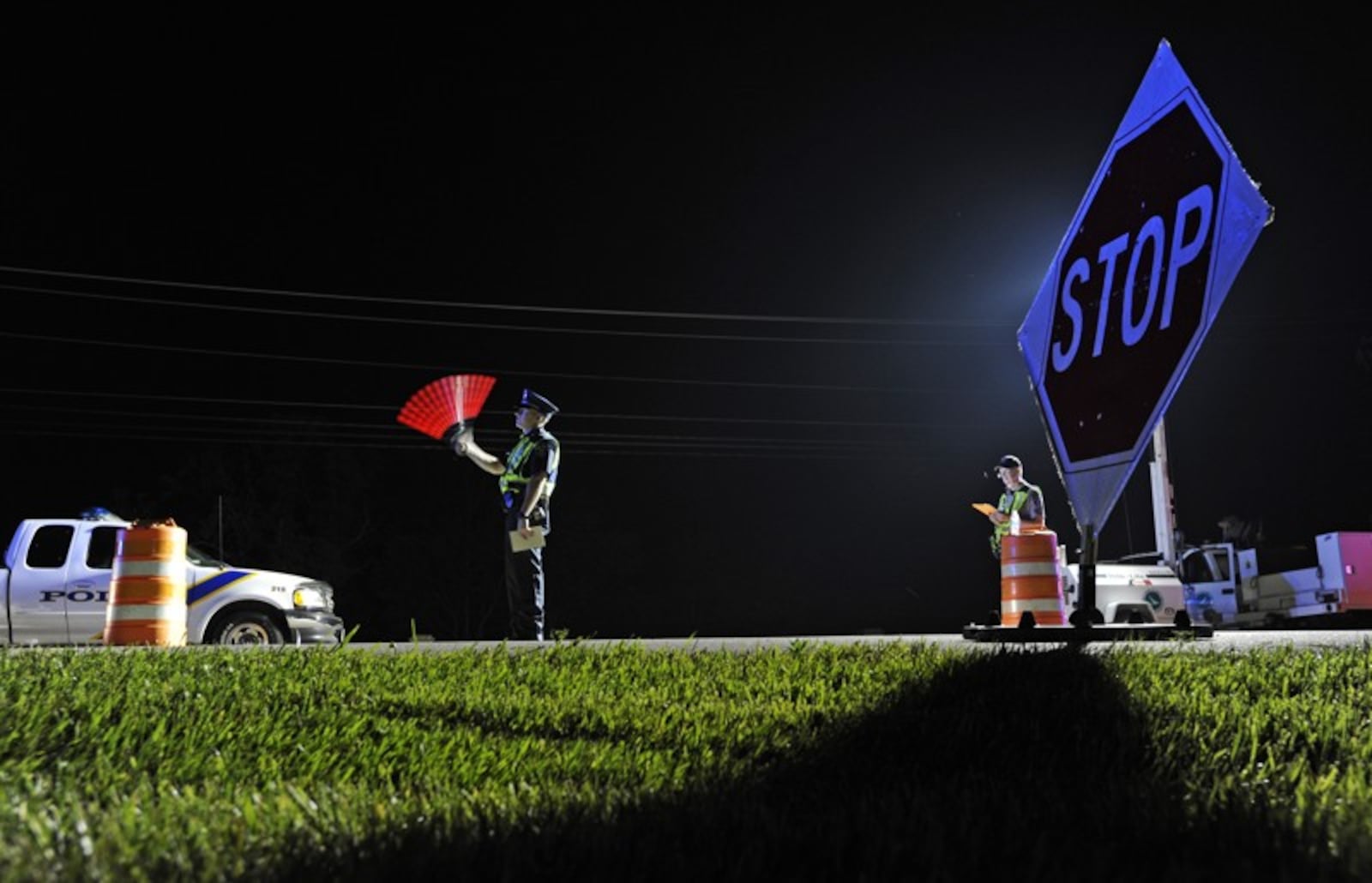 Officers from Monroe, Middletown and the Ohio State Highway Patrol participated in an OVI checkpoint in 2011 in Monroe, Ohio. Staff photo by Nick Graham. NICK GRAHAM/STAFF