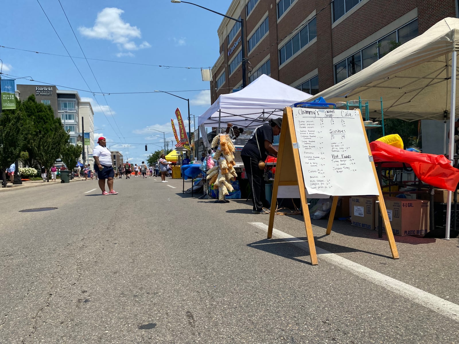 Venders at the street fair on Monument Avenue at the "Lights in Flight" festival at RiverScape MetroPark. Eileen McClory / Staff