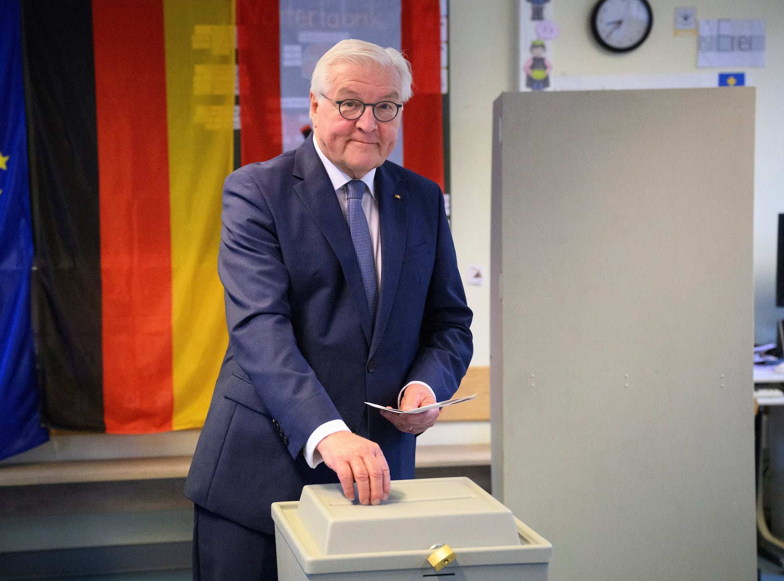 German President Frank-Walter Steinmeier casts his vote at a polling station in Berlin, Germany, Sunday, Feb. 23, 2025, during the national election. (Bernd von Jutrczenka/dpa via AP)