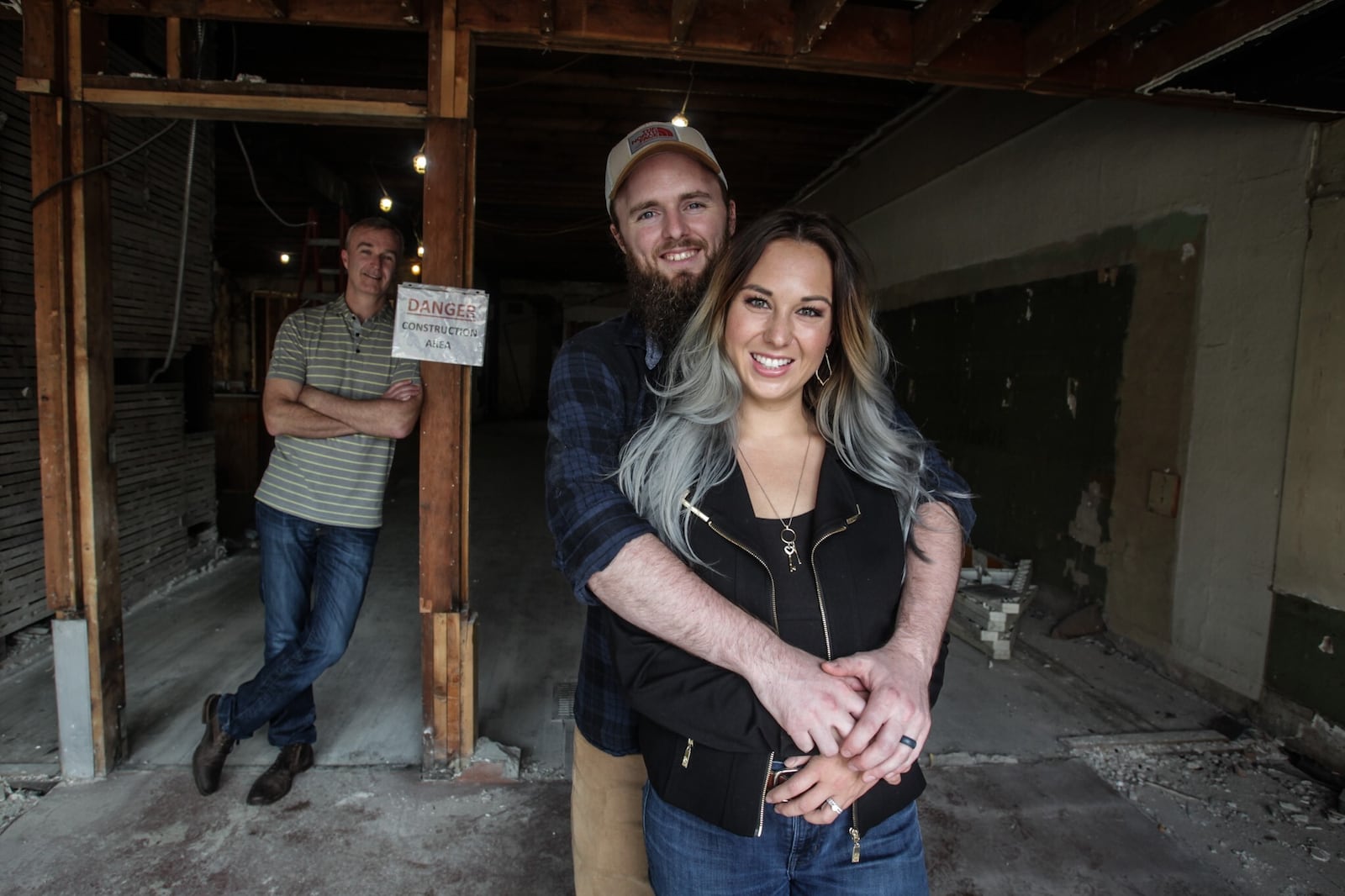 Jordan Joo and his wife Brianna Joo, along with Jordan's father Eric Joo, are reclaiming the old Suttman Men's and Boy's Wear building in downtown Miamisburg into Entropy Brewing Co. The multi-use building is expected to be finished in the fall of 2021. JIM NOELKER/STAFF