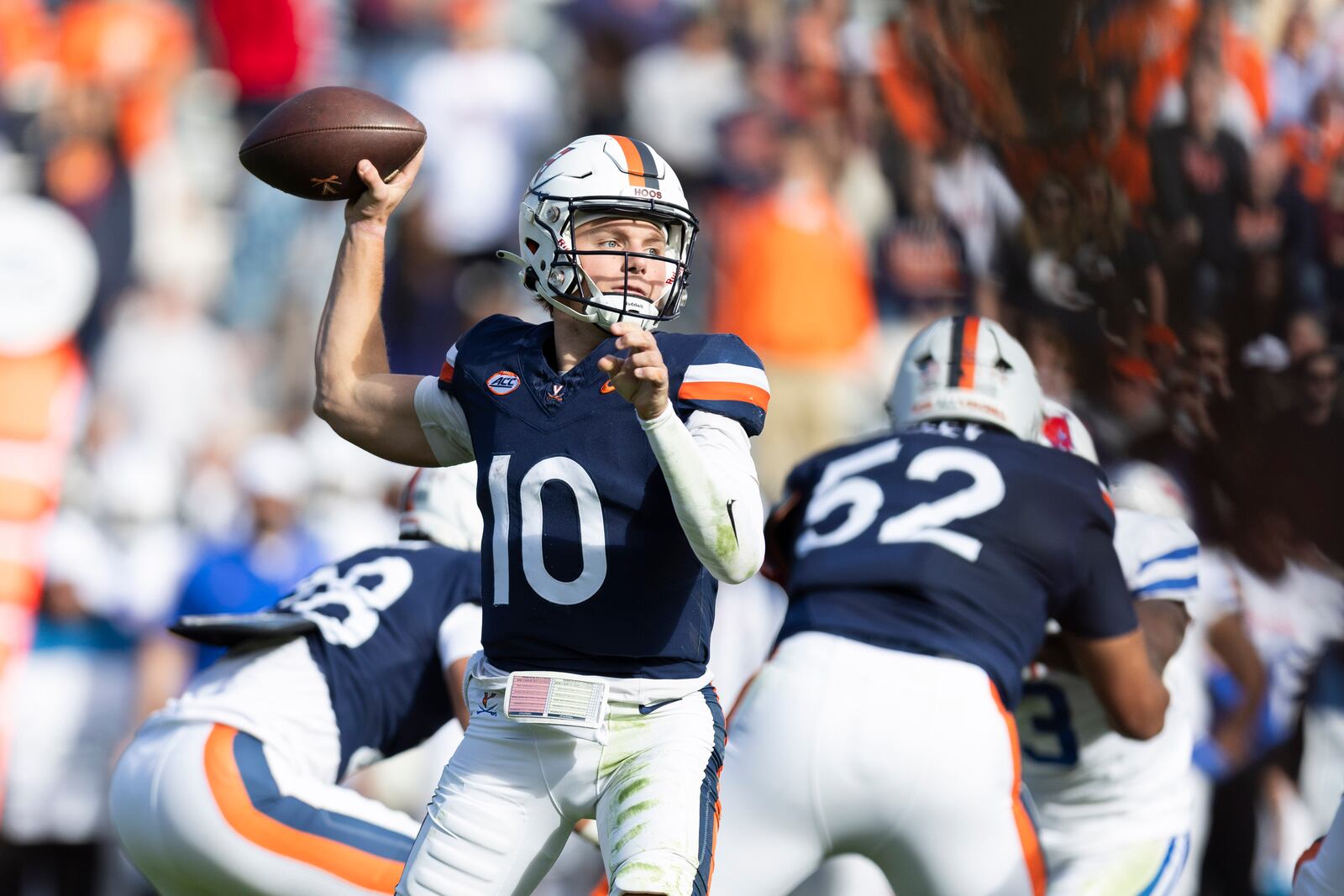 Virginia quarterback Anthony Colandrea (10) looks to make a pass against Southern Methodist during the first half of an NCAA college football game, Saturday, Nov. 23, 2024, in Charlottesville, Va. (AP Photo/Mike Kropf)