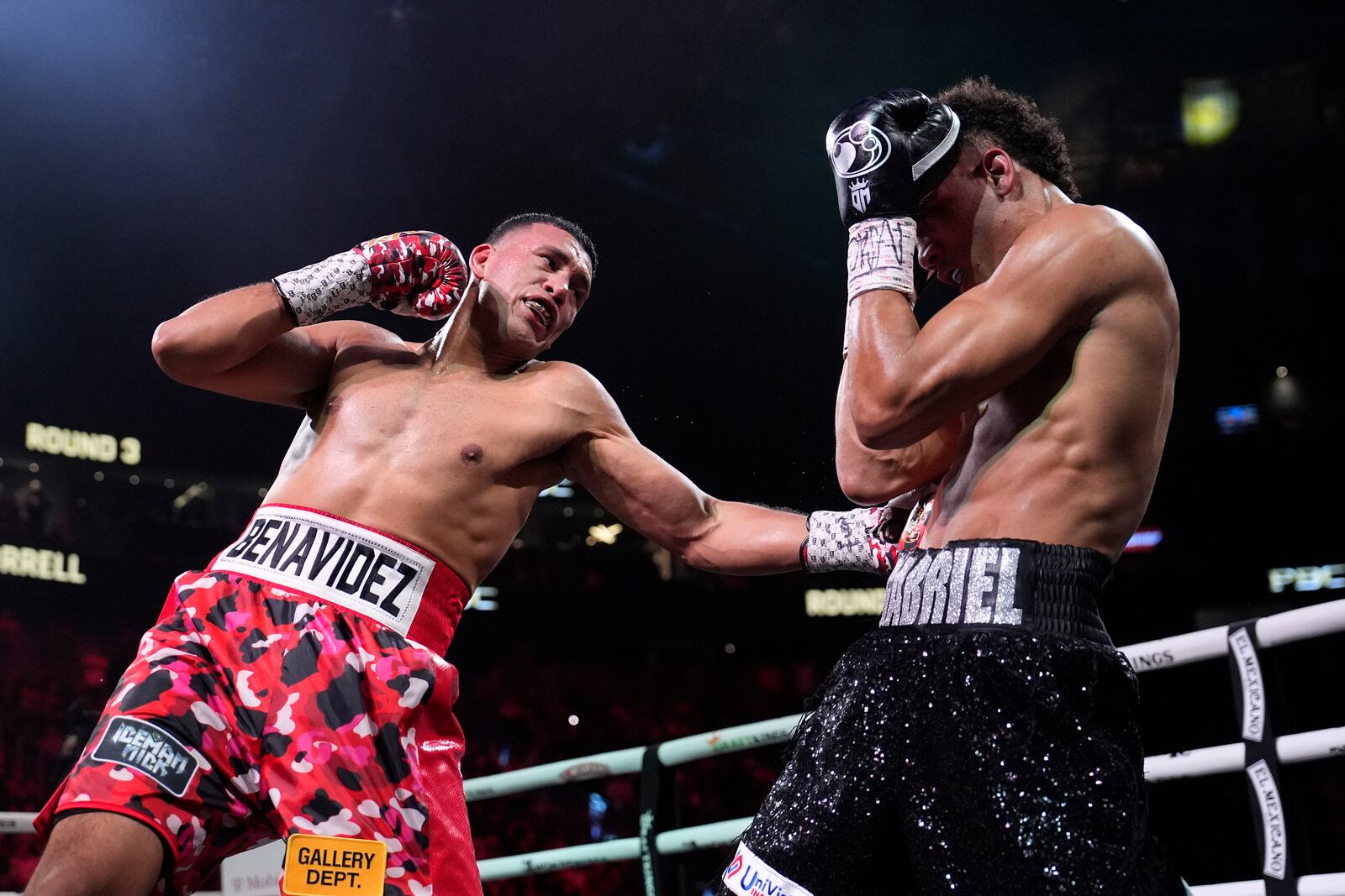 David Benavidez hitds David Morrell during a light heavyweight title boxing match Saturday, Feb. 1, 2025, in Las Vegas. (AP Photo/John Locher)