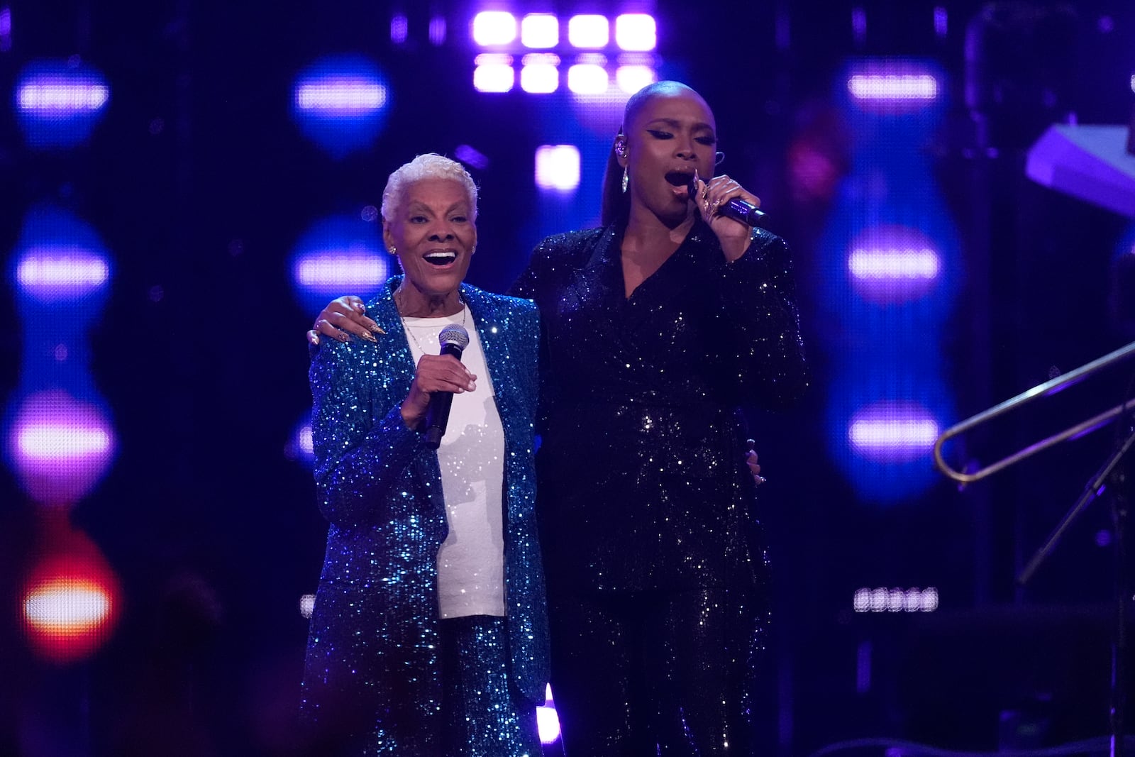 Dionne Warwick, left, and Jennifer Hudson perform during the 39th Annual Rock & Roll Hall of Fame Induction Ceremony on Saturday, Oct. 19, 2024, at Rocket Mortgage FieldHouse in Cleveland. (AP Photo/Chris Pizzello)