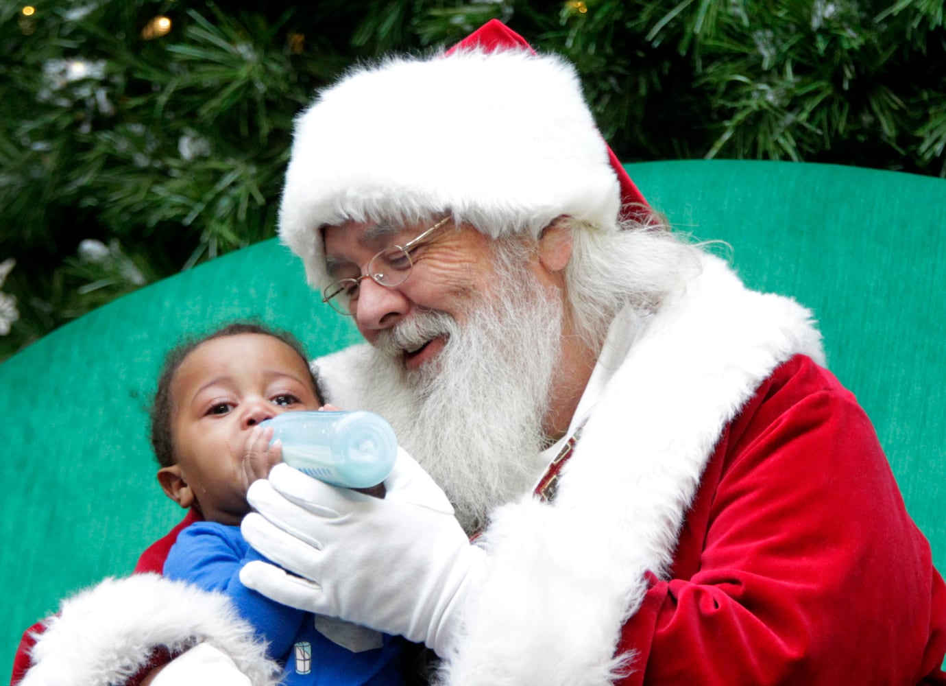 PHOTOS: A visit with Santa Claus makes the holiday season magical