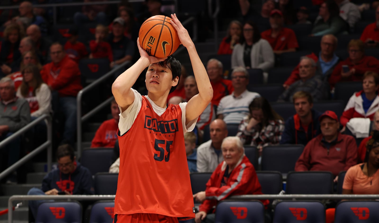 Dayton's Mike Sharavjamts warms up at the Red & Blue Game on Saturday, Oct. 15, 2022, at UD Arena. David Jablonski/Staff