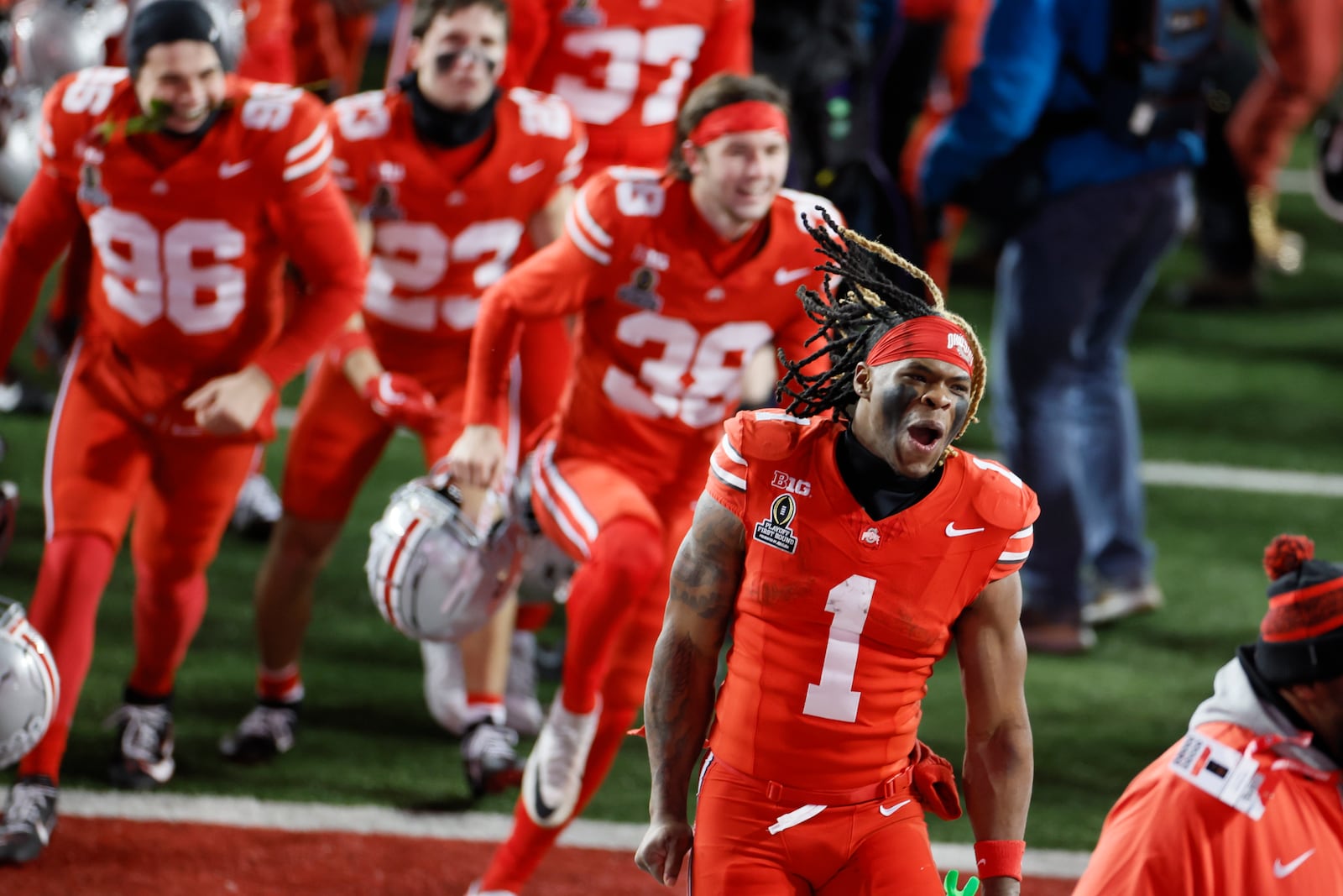 Ohio State running back Quinshon Judkins celebrates the team's win over Tennessee during the first round of the College Football Playoff, Saturday, Dec. 21, 2024, in Columbus, Ohio. (AP Photo/Jay LaPrete)