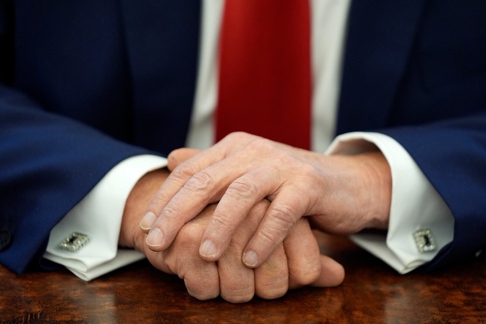 President Donald Trump speaks after signing executive orders in the Oval Office of the White House, Monday, Feb. 3, 2025, in Washington. (AP Photo/Evan Vucci)