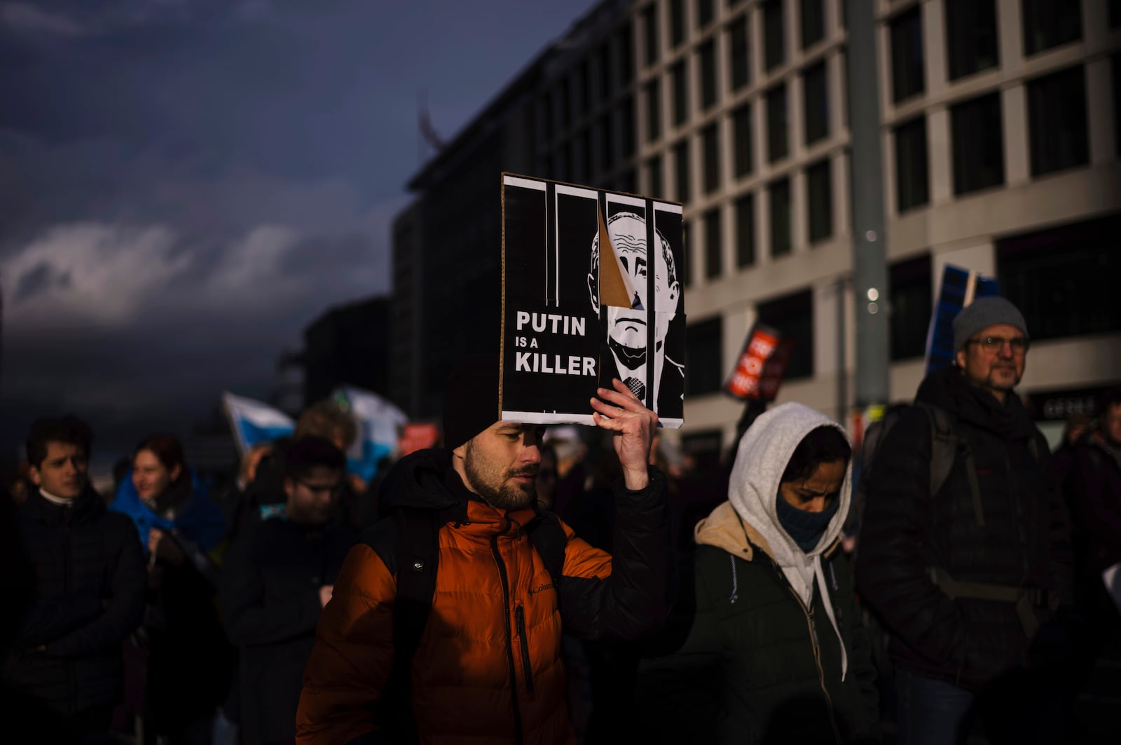 People attend a demonstration under the slogan "Stop Putin! Stop the War! Freedom for Political Prisoners!" in Berlin, Germany, Sunday, Nov. 17, 2024. (AP Photo/Markus Schreiber)