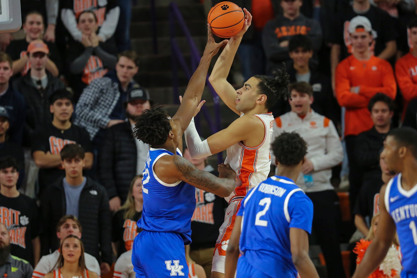 Kentucky center Amari Williams, left, blocks the shot attempt by Clemson center Christian Reeves, right, during the first half of an NCAA college basketball game, Tuesday, Dec. 3, 2024, in Clemson, S.C. (AP Photo/Artie Walker Jr.)