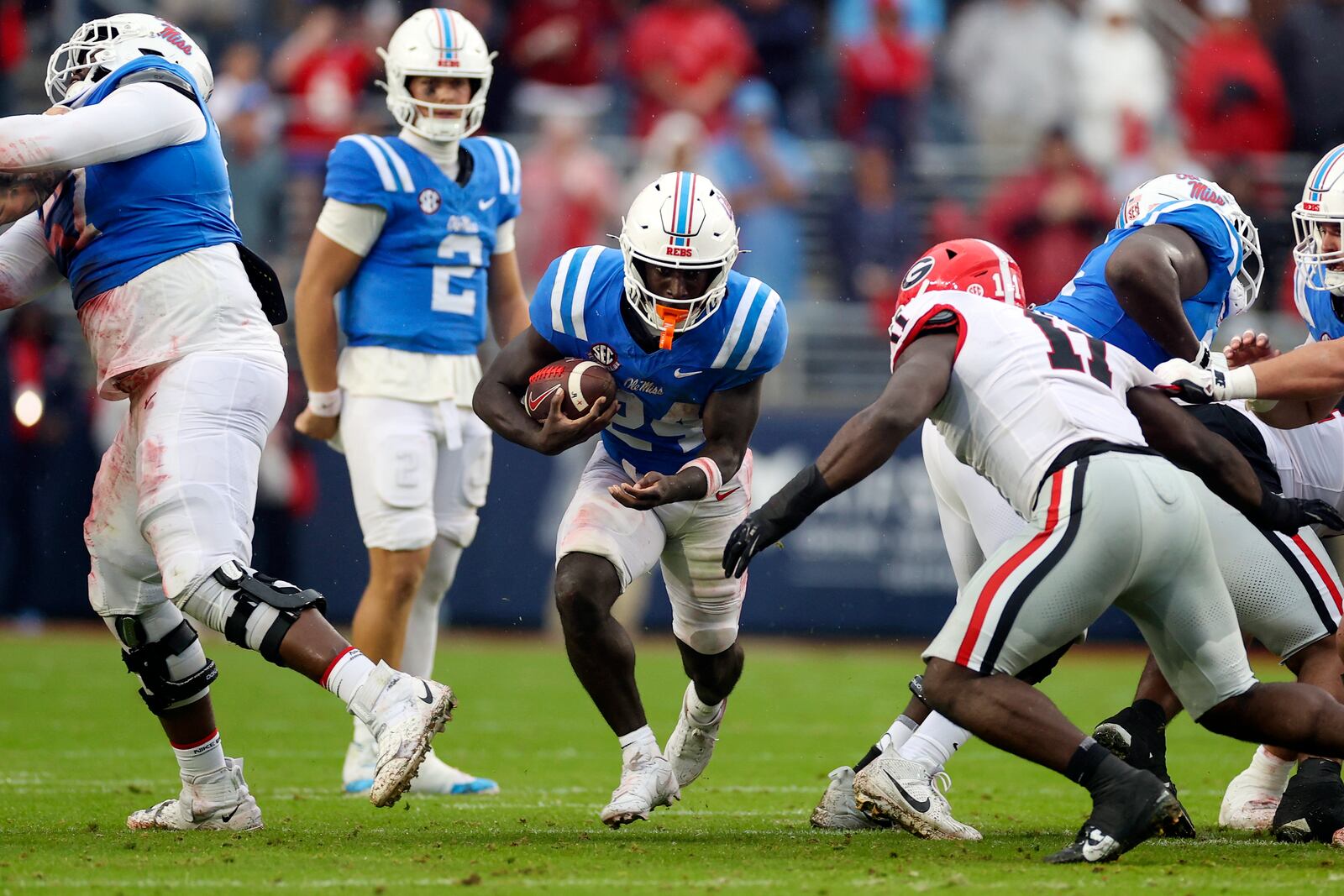 Mississippi running back Ulysses Bentley IV (24) runs the ball during the first half of an NCAA college football game against Georgia, Saturday, Nov. 9, 2024, in Oxford, Miss. (AP Photo/Randy J. Williams)