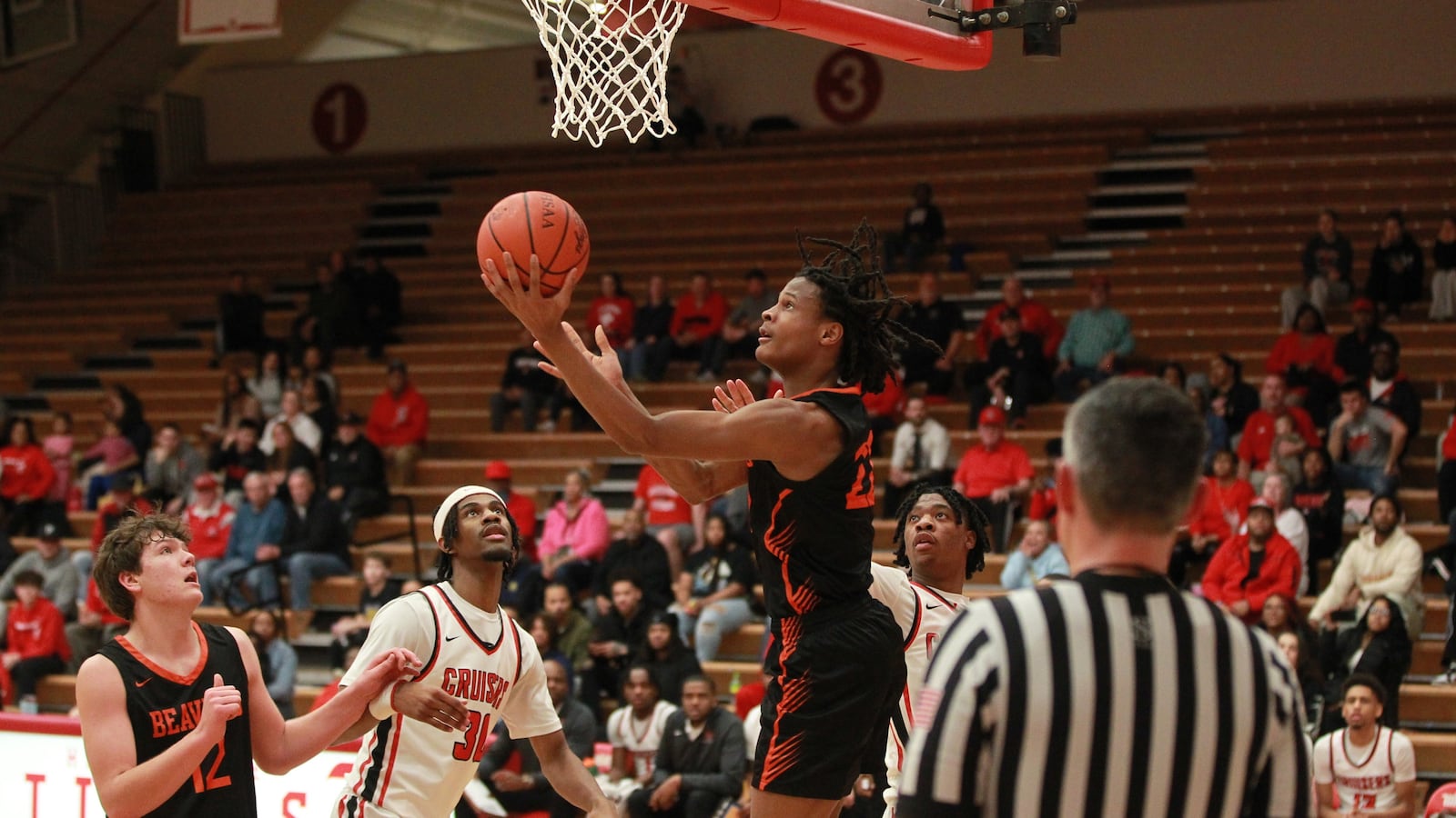 Beavercreek guard Isaiah-Micheal Williams reverse layup Beavercreek Groveport-Madison boys basketball regional semifinal Groveport-Madison boys basketball regional semifinal March 4, 2024 at Wittenberg.