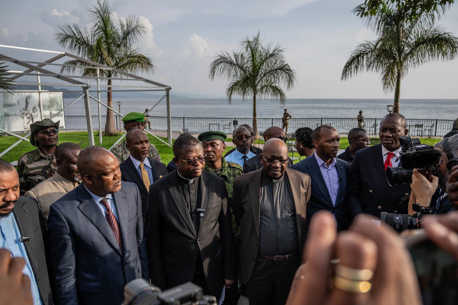 Members of the National Episcopal Conference of Congo and the Church of Christ speak to the media after a meeting with the leader of the political military coalition in Goma, Democratic Republic of the Congo, Wednesday, Feb. 12, 2025. (AP Photo/Moses Sawasawa)