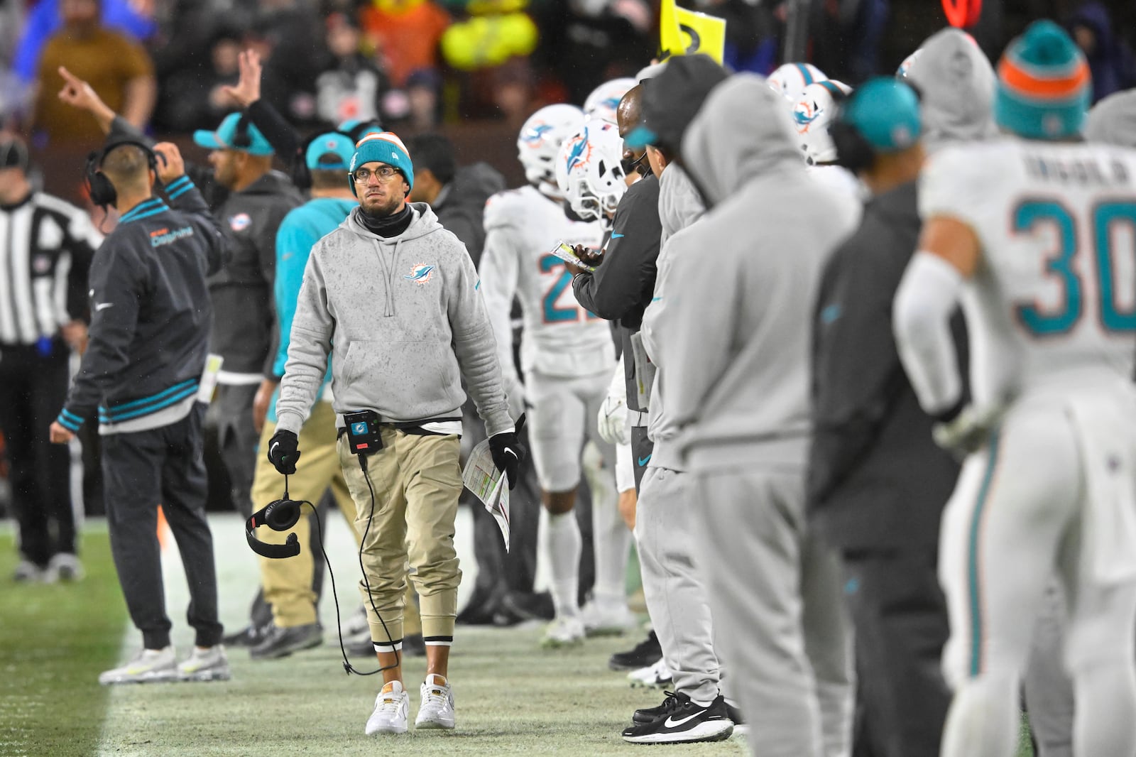 Miami Dolphins head coach Mike McDaniel walks on the sideline during the second half of an NFL football game against the Cleveland Browns Sunday, Dec. 29, 2024, in Cleveland. (AP Photo/David Richard)