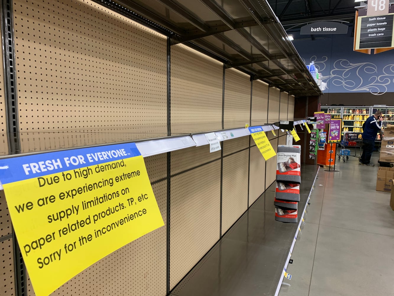 PHOTOS: Long lines, empty shelves at local grocery stores