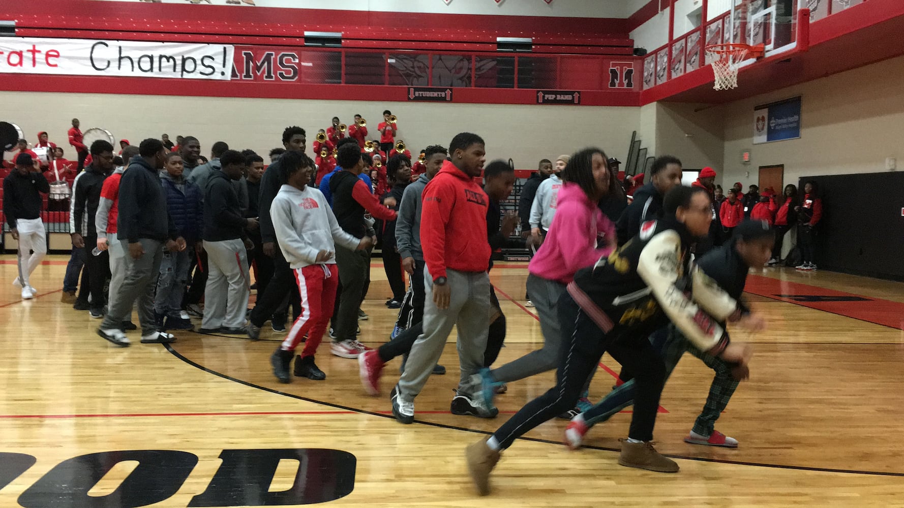 PHOTOS: Trotwood parents and fans welcome home football state champs at victory celebration