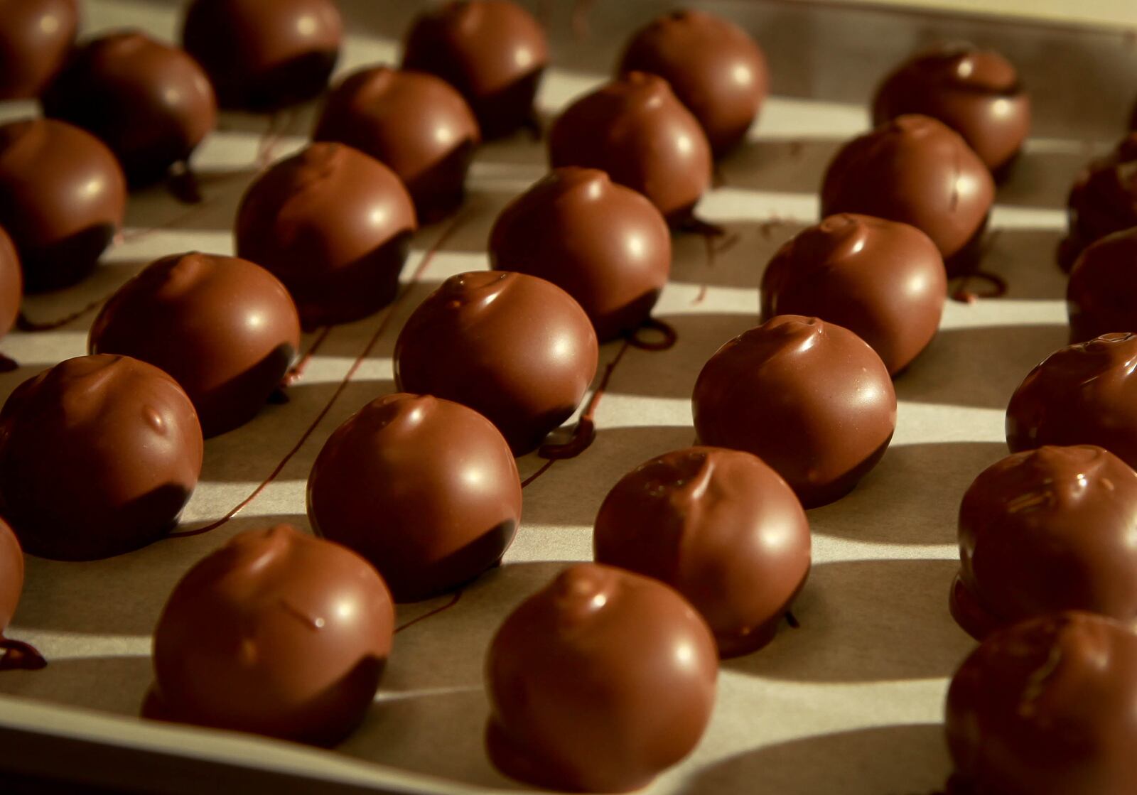 DETAIL: Bellbrook Chocolates, a 30-year-old local business currently located in the Cross Pointe Center and expanding to other locations. JIM WITMER / STAFF