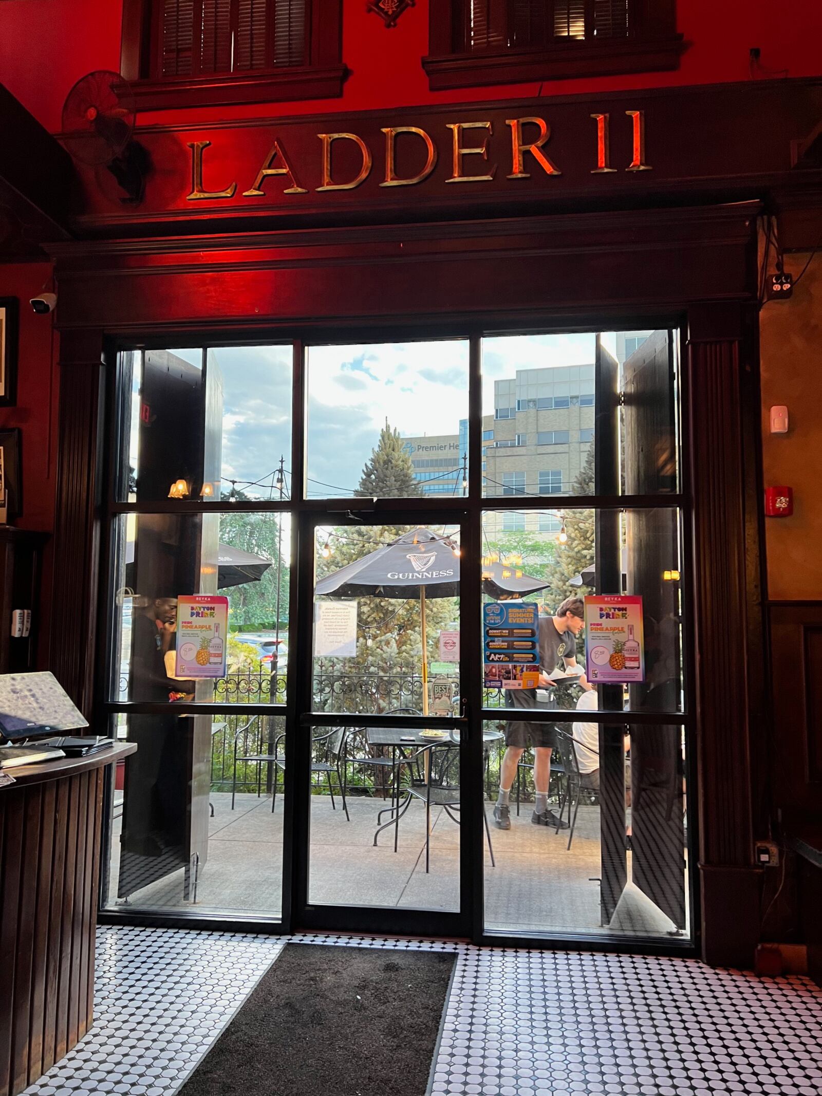 A view of Jimmie's Ladder 11 front patio from inside of the restaurant