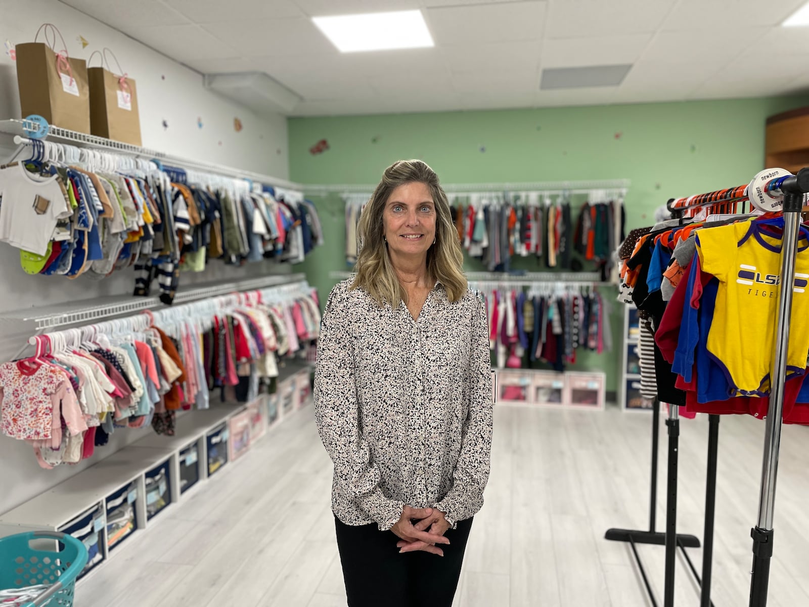 Margie Christie, executive director of Dayton Right to Life, pictured in the Stork's Nest, Dayton Right to Life's baby pantry. They provide free baby and toddler supplies to clients in need. SAM WILDOW\STAFF