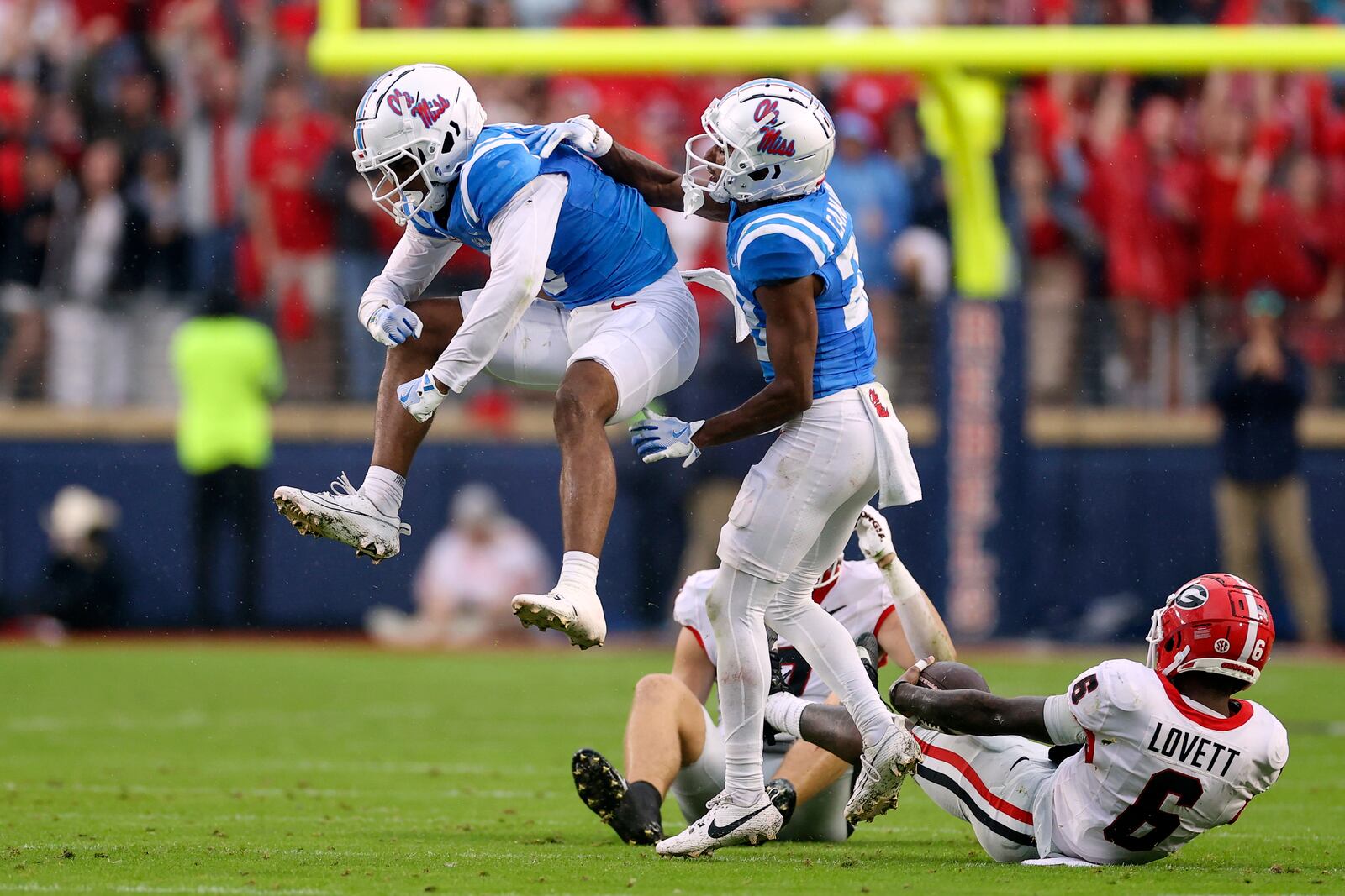 Mississippi safeties John Saunders Jr. (5) and Jadon Canady (28) react during the first half of an NCAA college football game against Georgia, Saturday, Nov. 9, 2024, in Oxford, Miss. (AP Photo/Randy J. Williams)