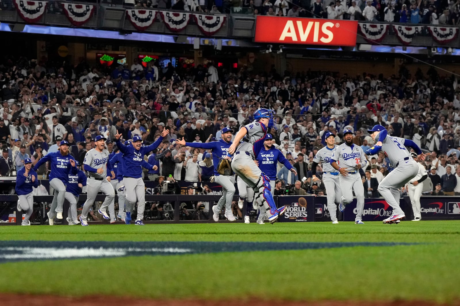 The Los Angeles Dodgers celebrate their win against the New York Yankees in Game 5 to win the baseball World Series, Wednesday, Oct. 30, 2024, in New York. (AP Photo/Godofredo A. Vásquez)