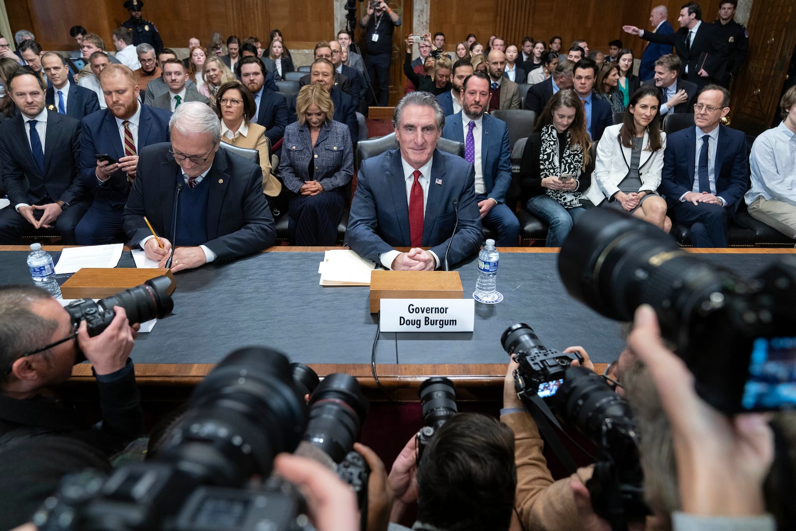 FILE - Former Gov. Doug Burgum, President-elect Donald Trump's choice to lead the the Interior Department as Secretary of the Interior, arrives to testify before the Senate Energy and Natural Resources Committee on Capitol Hill in Washington, Thursday, Jan. 16, 2025. (AP Photo/Jose Luis Magana, File)