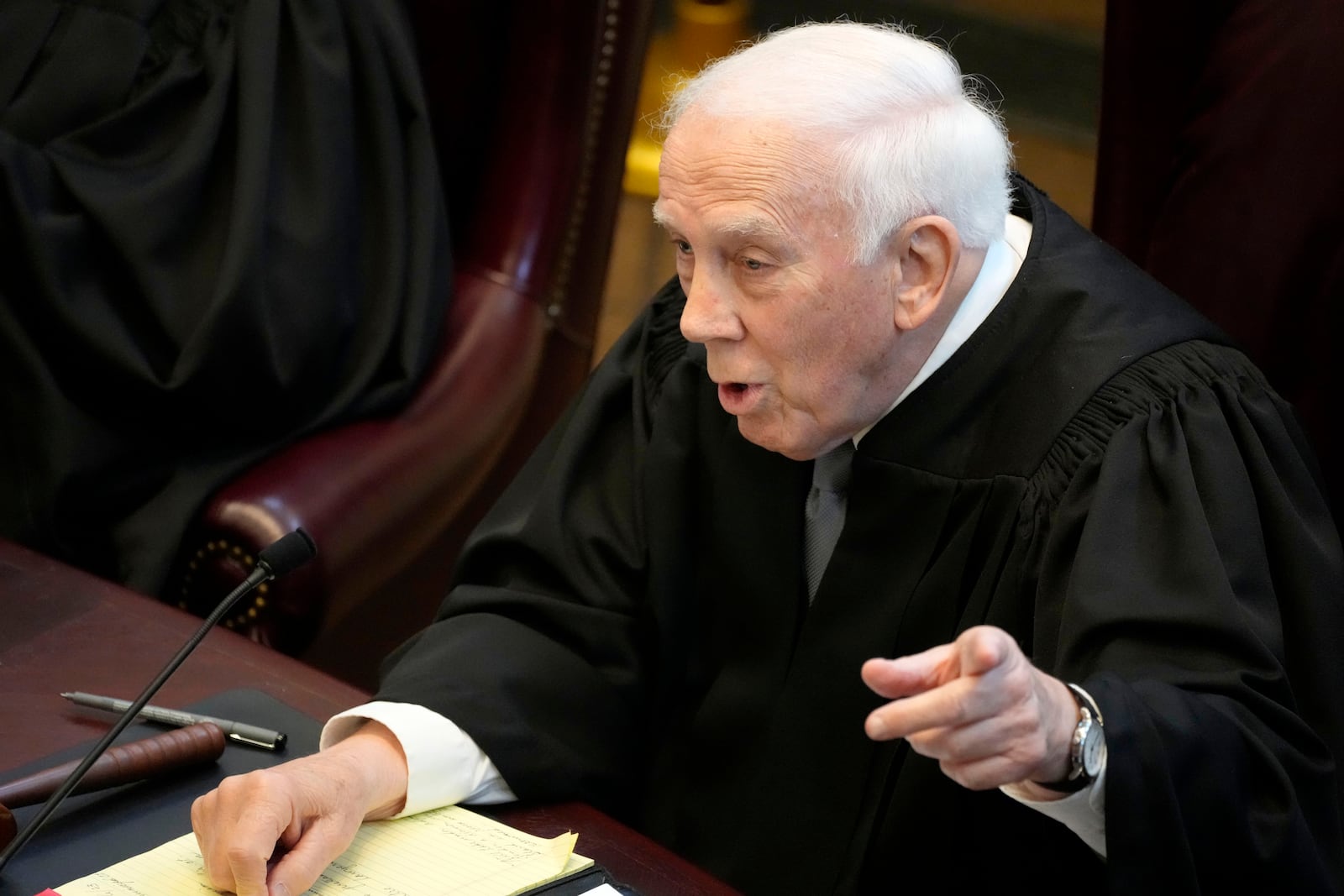 FILE - Mississippi Supreme Court Presiding Justice James W. Kitchens asks a question, July 6, 2023, before the court in Jackson, Miss. (AP Photo/Rogelio V. Solis, File)