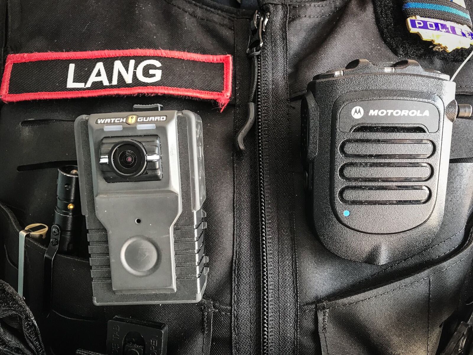 Englewood police Sgt. Mike Lang wears a WatchGuard body camera. The Montgomery County Sheriff's Office received initial approval by a county board Wednesday to purchase 200 units of the same model. JIM NOELKER / STAFF