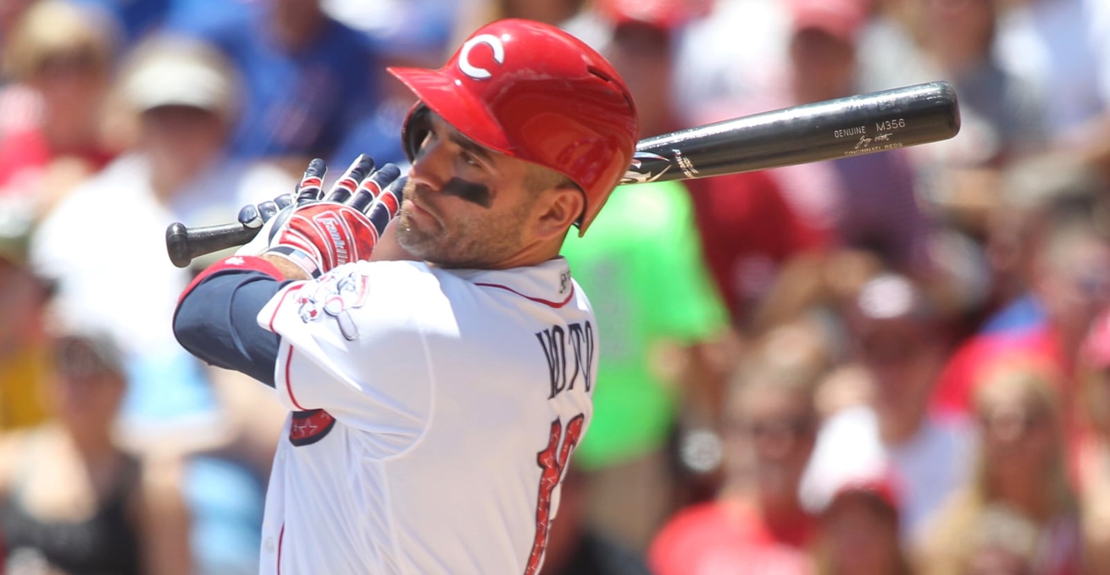 The Reds’ Joey Votto singles against the Cubs on Sunday, July 2, 2017, at Great American Ball Park in Cincinnati. David Jablonski/Staff