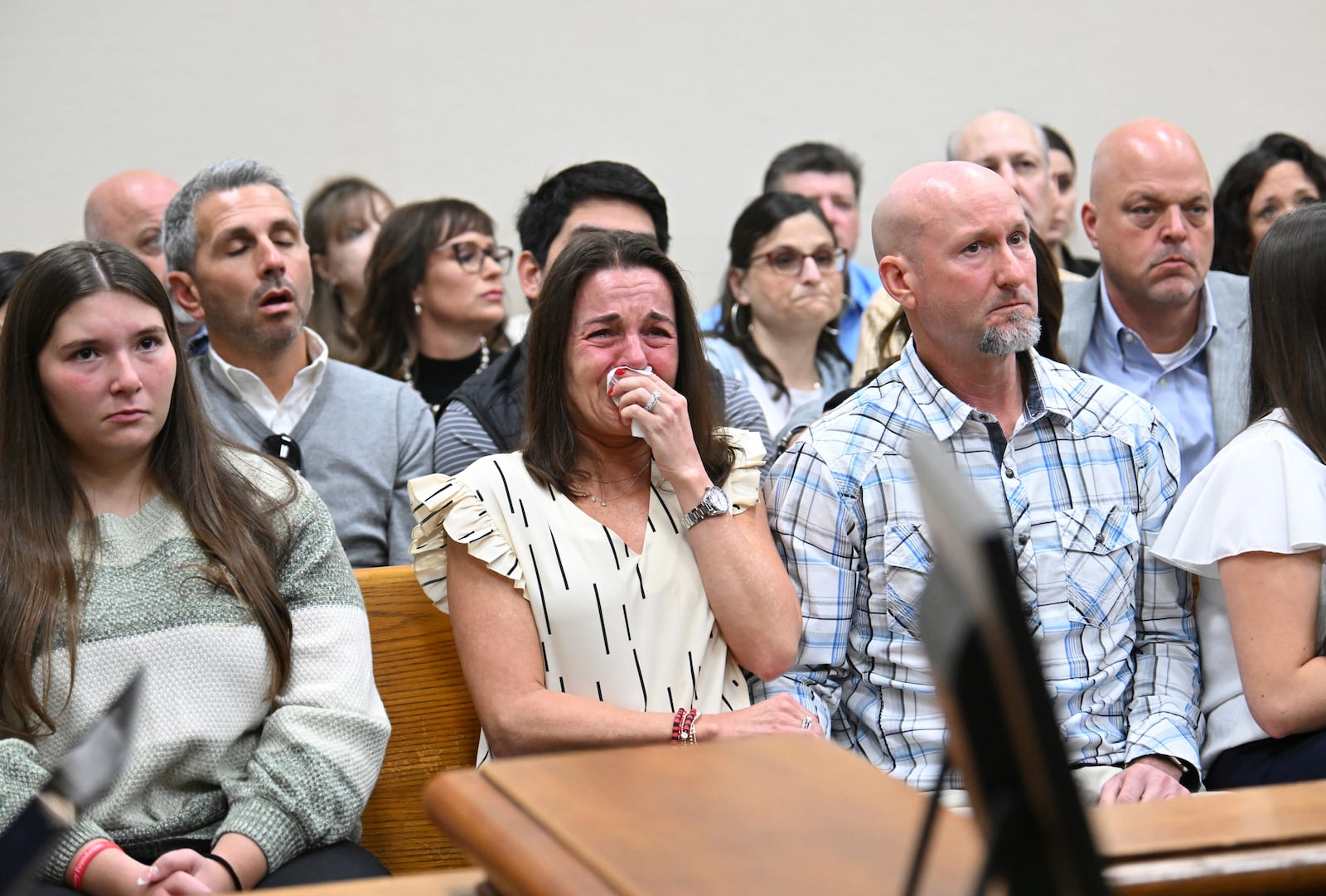 Allyson Phillips, second from left, mother of Jose Ibarra, accused of killing a Georgia nursing student earlier this year, reacts as John Phillips, stepfather of Jose Ibarra, comforts her during a trial of Jose Ibarra at Athens-Clarke County Superior Court, Friday, Nov. 15, 2024, in Athens, Ga. (Hyosub Shin/Atlanta Journal-Constitution via AP, Pool)