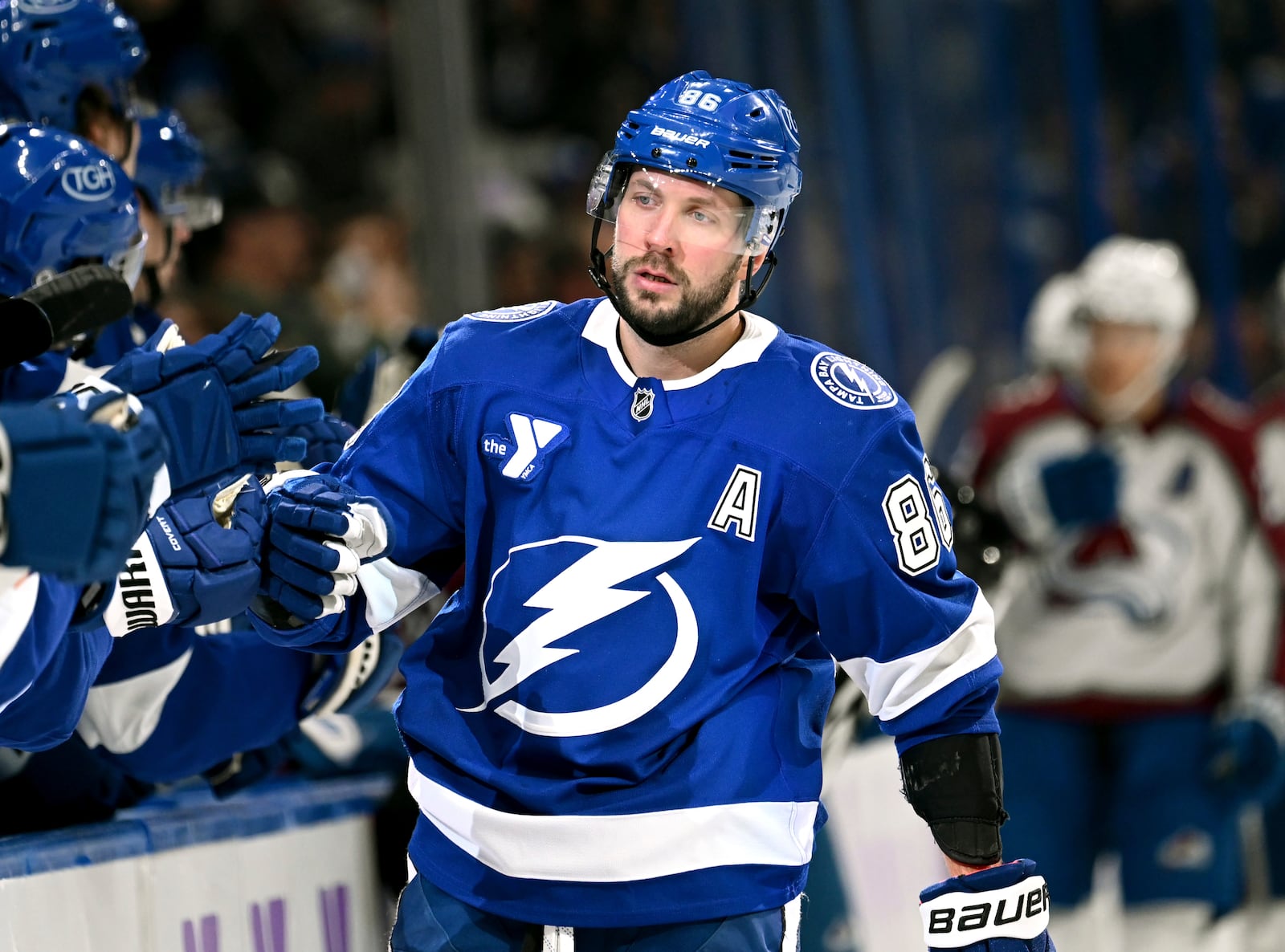 Tampa Bay Lightning right wing Nikita Kucherov (86) celebrates after his goal during the first period of an NHL hockey game against the Colorado Avalanche, Monday, Nov. 25, 2024, in Tampa, Fla. (AP Photo/Jason Behnken)