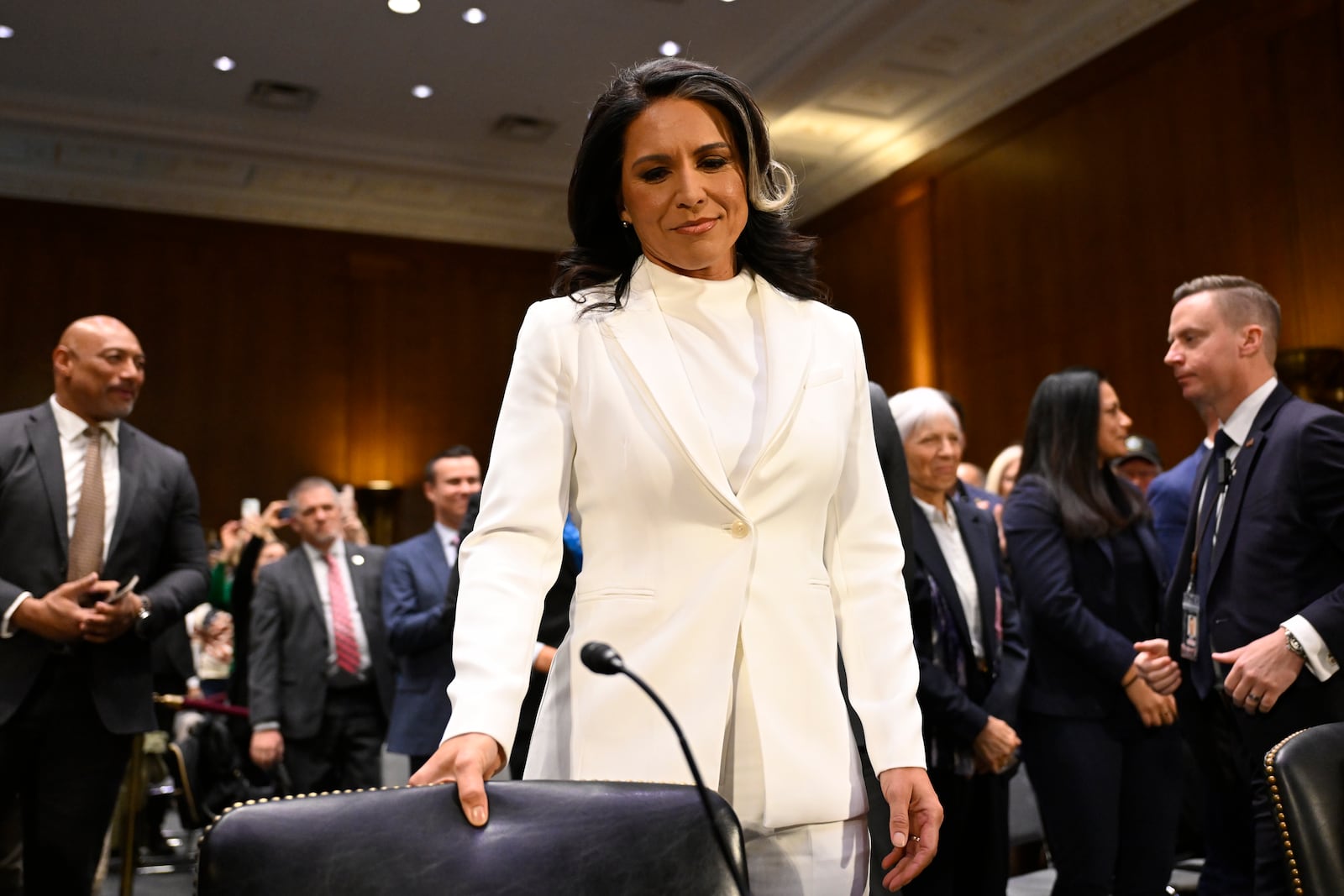 Former Rep. Tulsi Gabbard, President Donald Trump's choice to be the Director of National Intelligence, appears before the Senate Intelligence Committee for her confirmation hearing at the U.S. Capitol, Thursday, Jan. 30, 2025, in Washington. (AP Photo/John McDonnell)