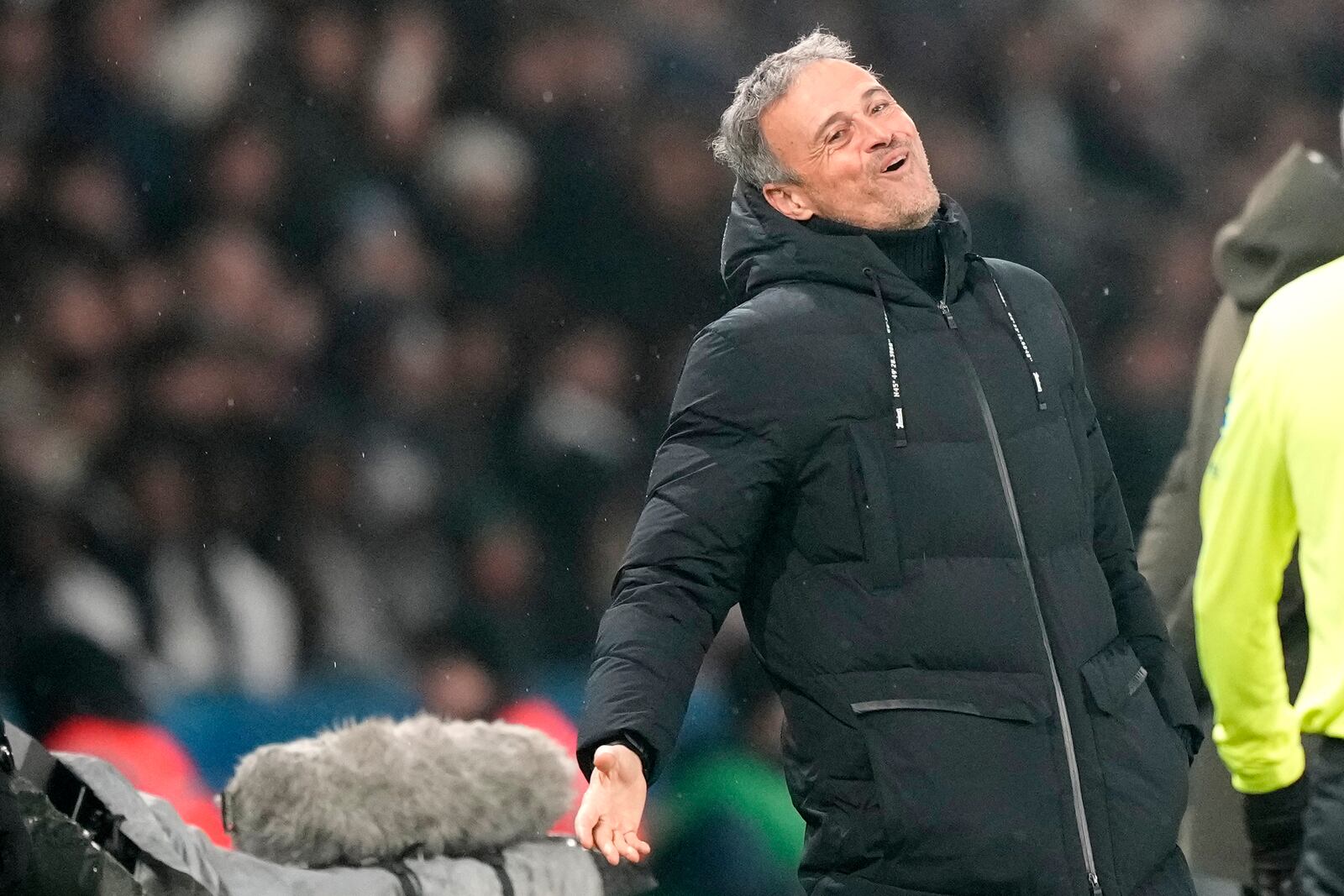 PSG's head coach Luis Enrique grimaces during the French League One soccer match between Paris Saint-Germain and Monaco at Parc des Princes stadium in Paris, Friday, Feb. 7, 2025. (AP Photo/Michel Euler)