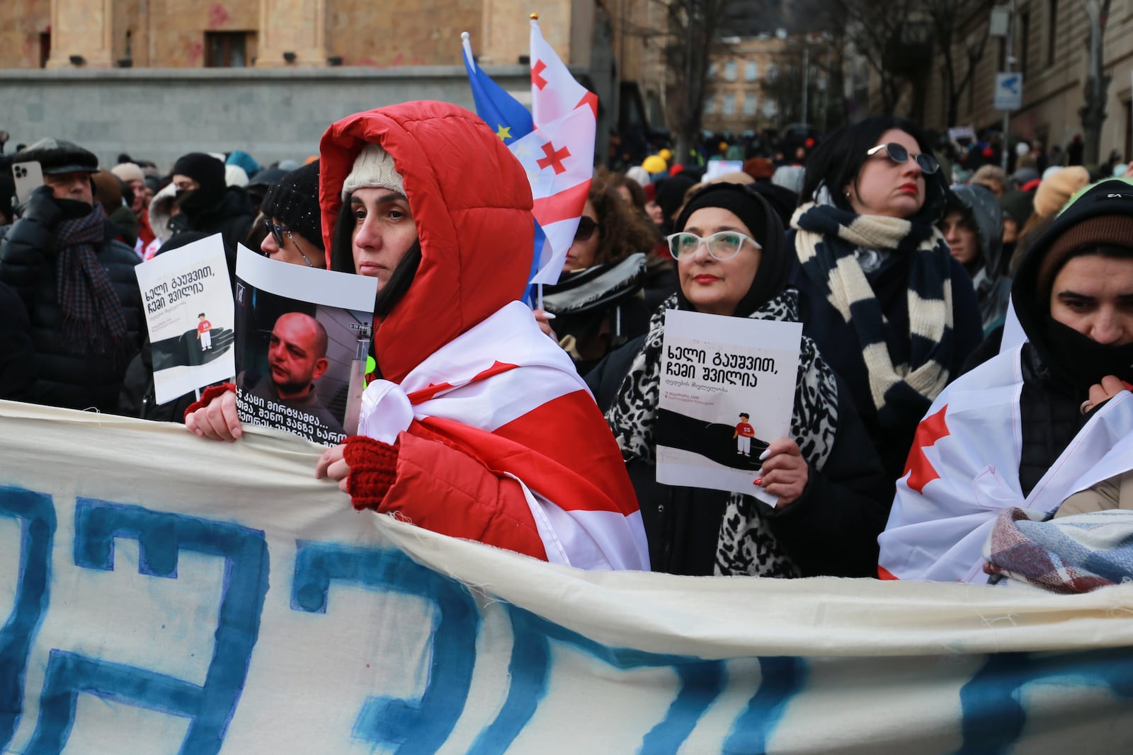 People protest outside of the Georgian parliament as the parliament begins the procedure of the presidential elections, in Tbilisi, Georgia, Saturday, Dec. 14, 2024 (AP Photo/Zurab Tsertsvadze)