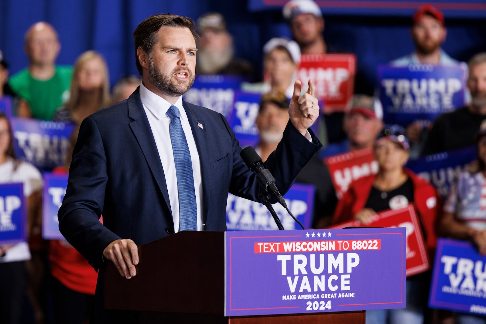 
                        Sen. JD Vance (R-Ohio), the Republican vice presidential nominee, speaks during a campaign rally in Eau Claire, Wis., on Sept. 17, 2024. Vance said on Wednesday, Sept. 18, 2024, that he would continue to describe Haitian residents in Springfield, Ohio, as “illegal aliens” even though most of them are in the country legally. (Jenn Ackerman/The New York Times)
                      