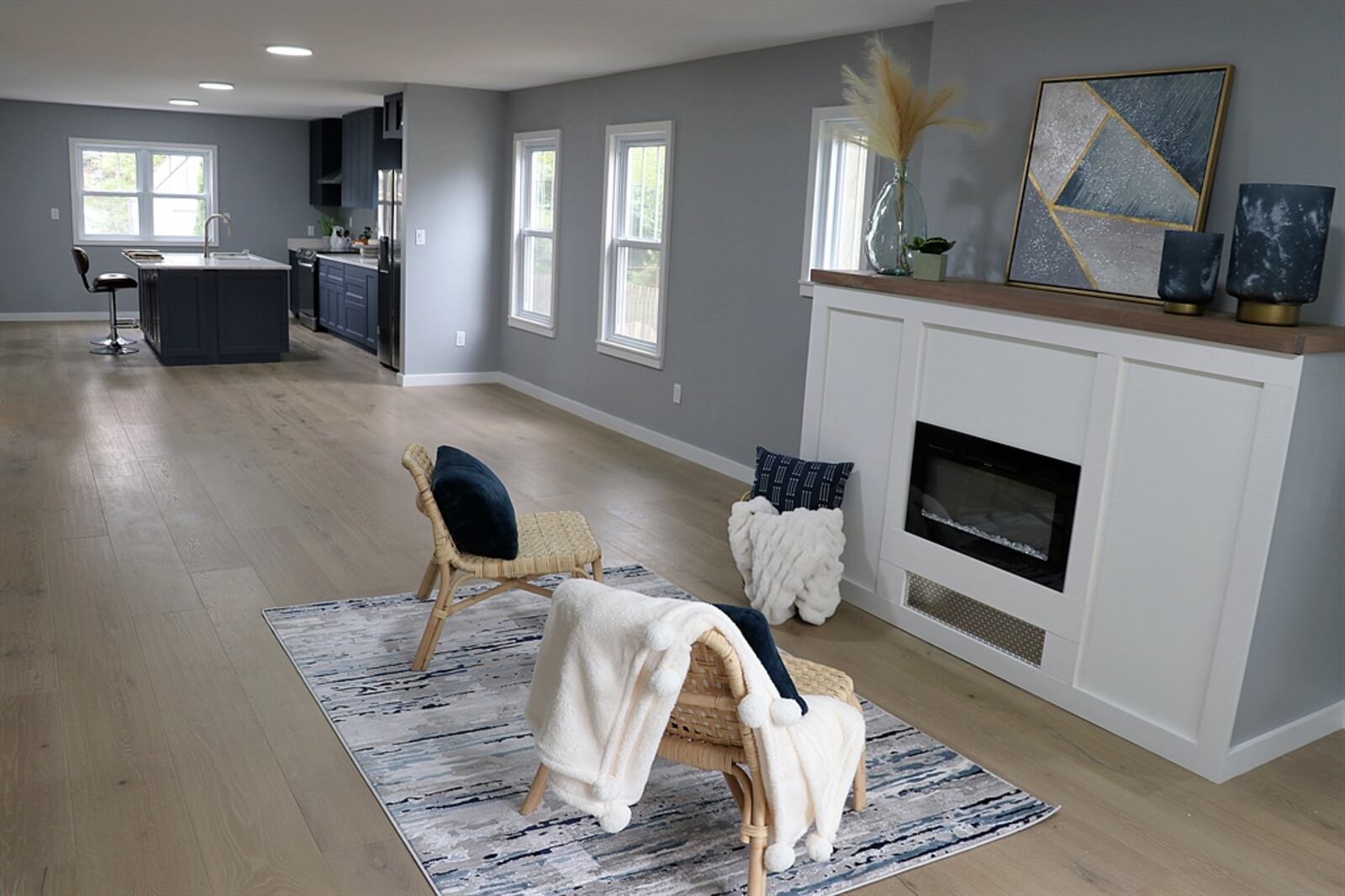 The floor plan was redesigned into an open concept on the main level with a combined living room, dining room and kitchen. 